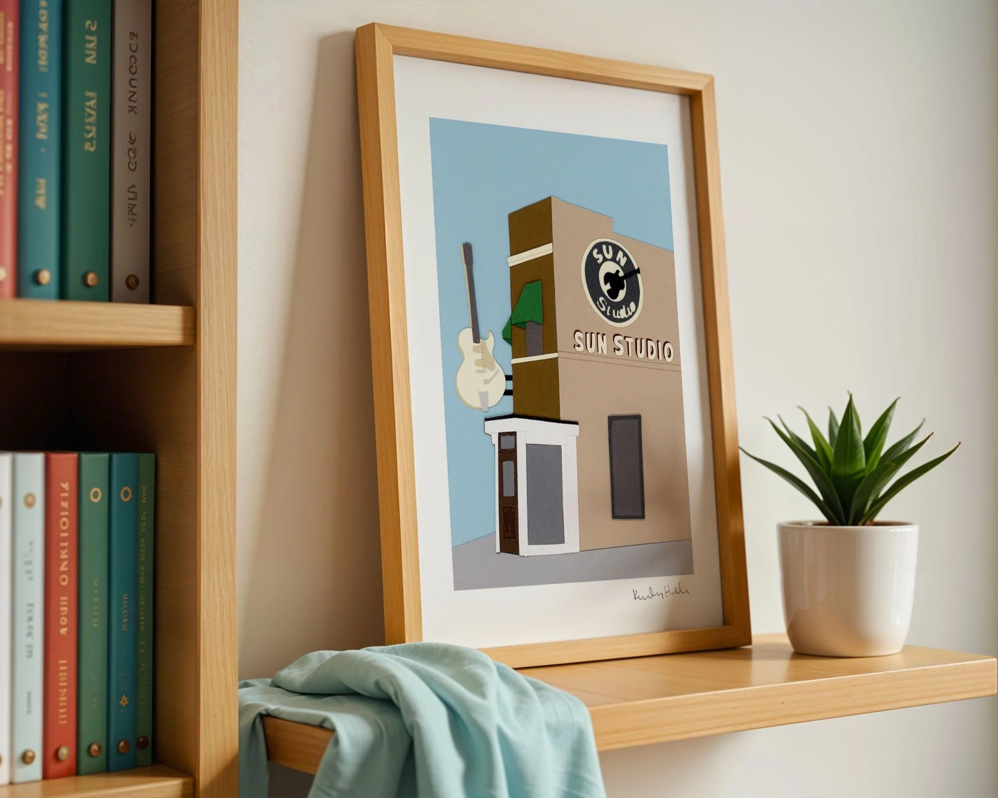 Sun Studio art print framed leaning on bookshelf