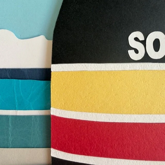 Macro of a stone texture pressed into the paper stripes of the Southernmost Point buoy