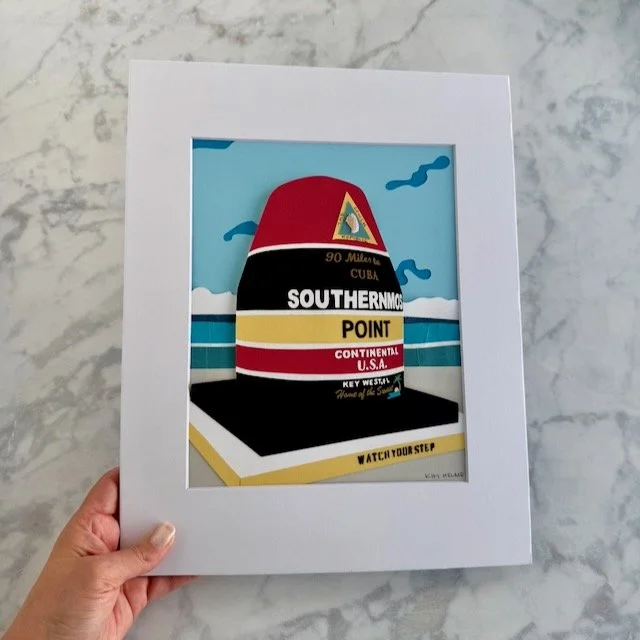 Southernmost Point 8x10 original paper illustration in an 11x14 mat, held in a woman's hand for size
