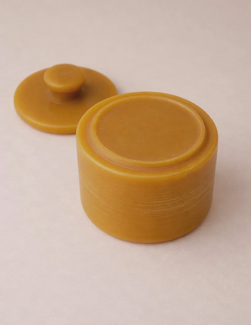 Pure beeswax lidded keepsake and storage box for herbs, sugar, jewelry, or small objects. Showing the bottom and lid for detail.