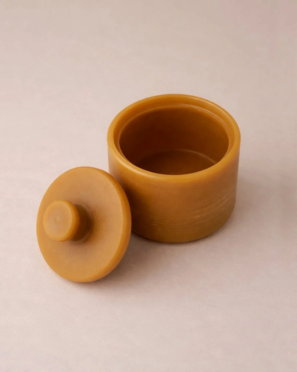Pure beeswax lidded keepsake and storage box for herbs, sugar, jewelry, or small objects. Shown open to see the interior structure detail.