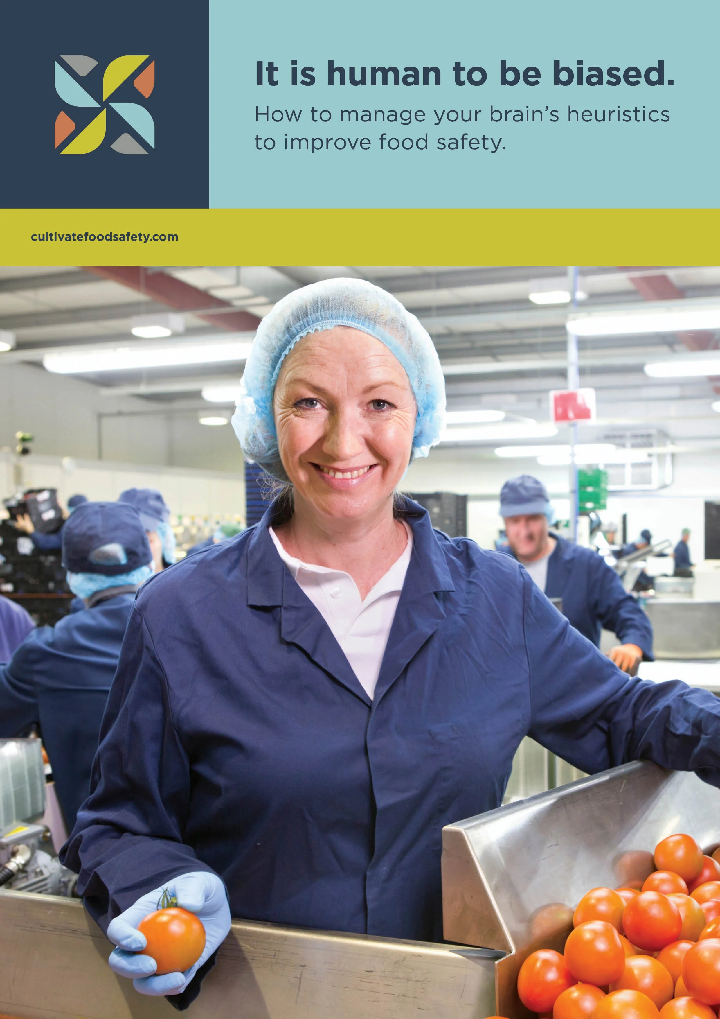 Smiling worker in blue uniform and hairnet holding tomatoes in a food processing facility with a text overlay about managing biases for food safety.