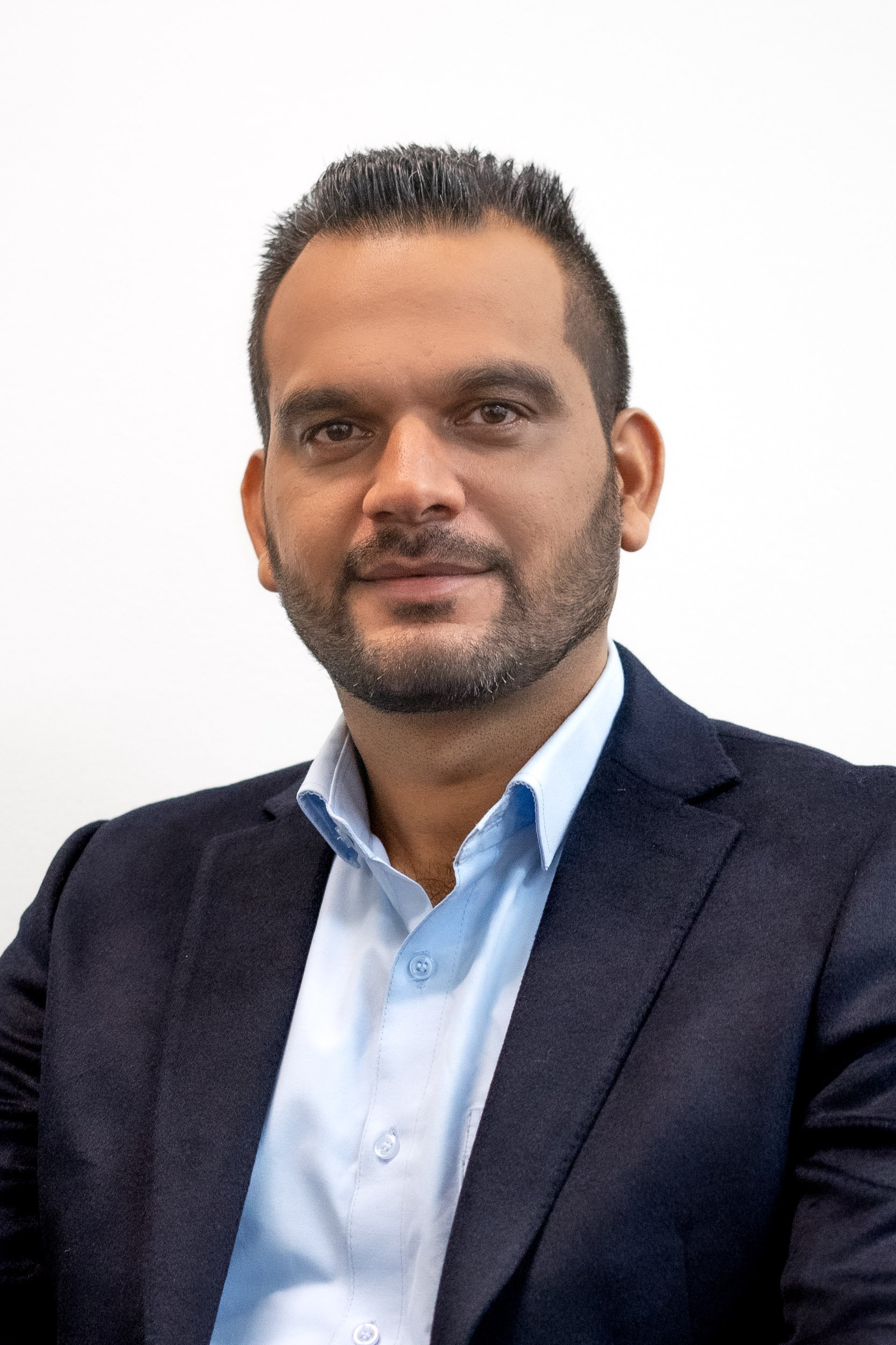 SATINDER HEADSHOT-10.jpg