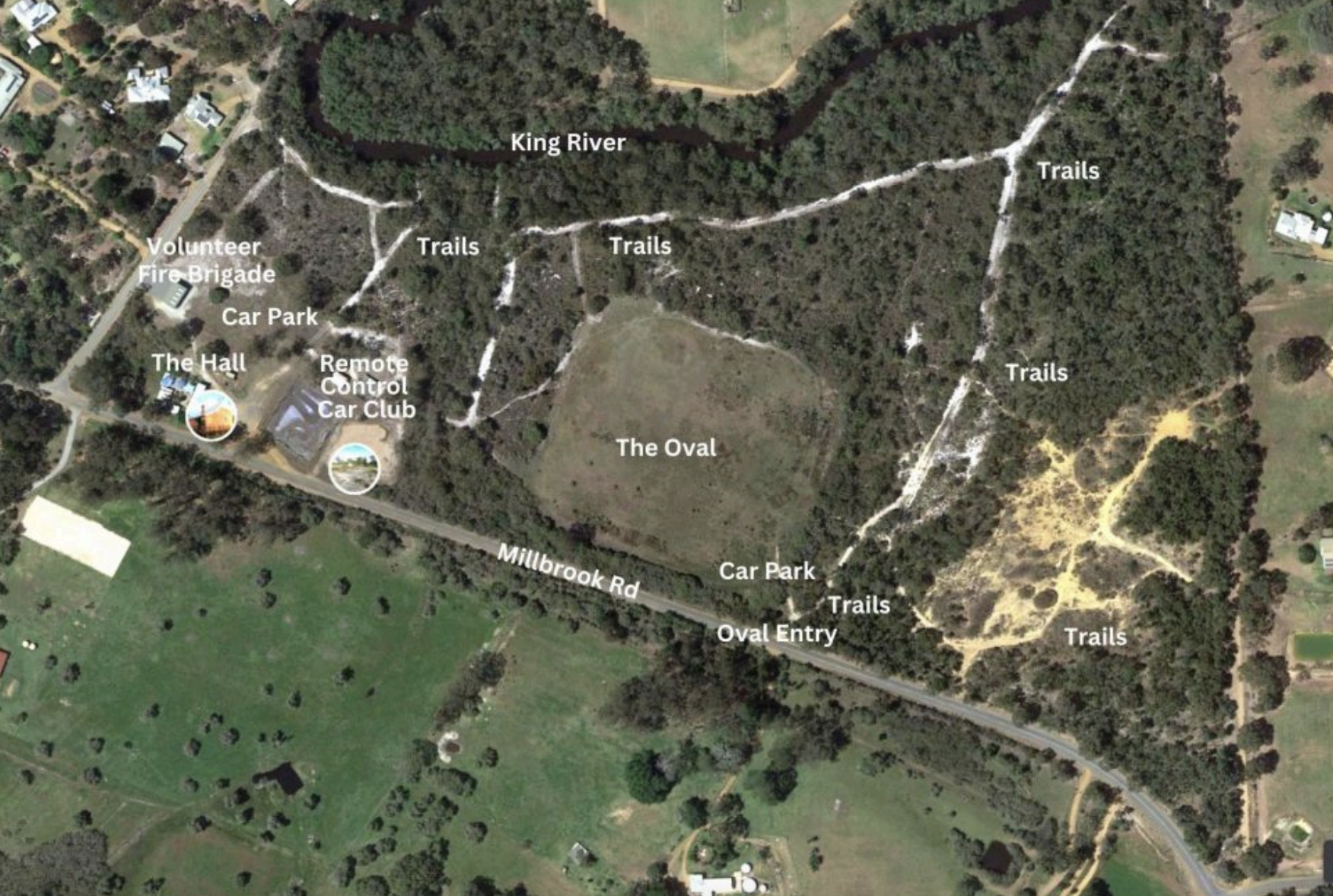 Aerial image of an area labeled with features such as 'Volunteer Fire Brigade,' 'Car Park,' 'The Hall,' 'Remote Control Car Club,' 'The Oval,' and 'Trails.' The King River runs through the area, and Millbrook Rd is visible at the bottom. Multiple trails and green spaces are present.