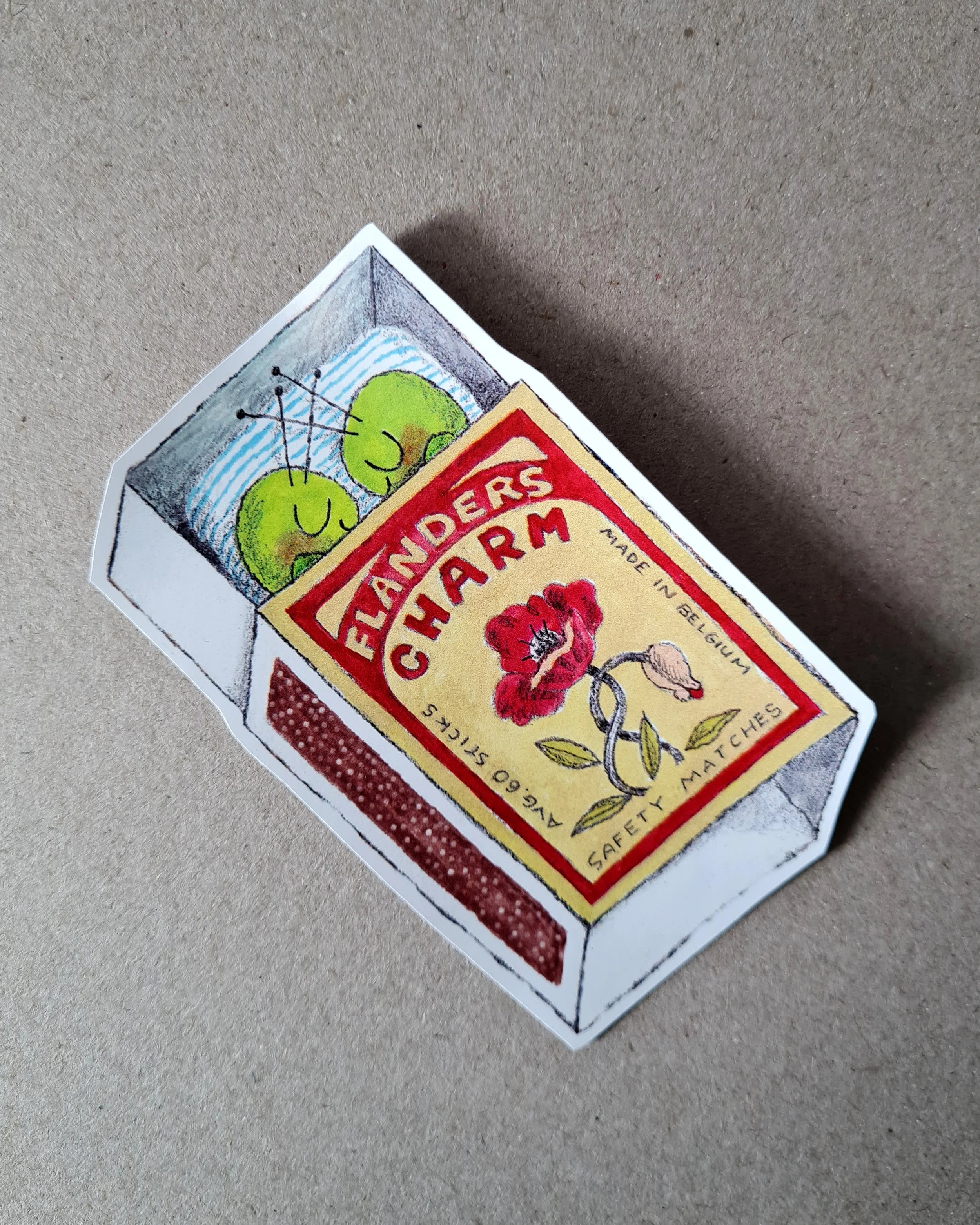 two little bugs snuggling inside a vintage matchbox