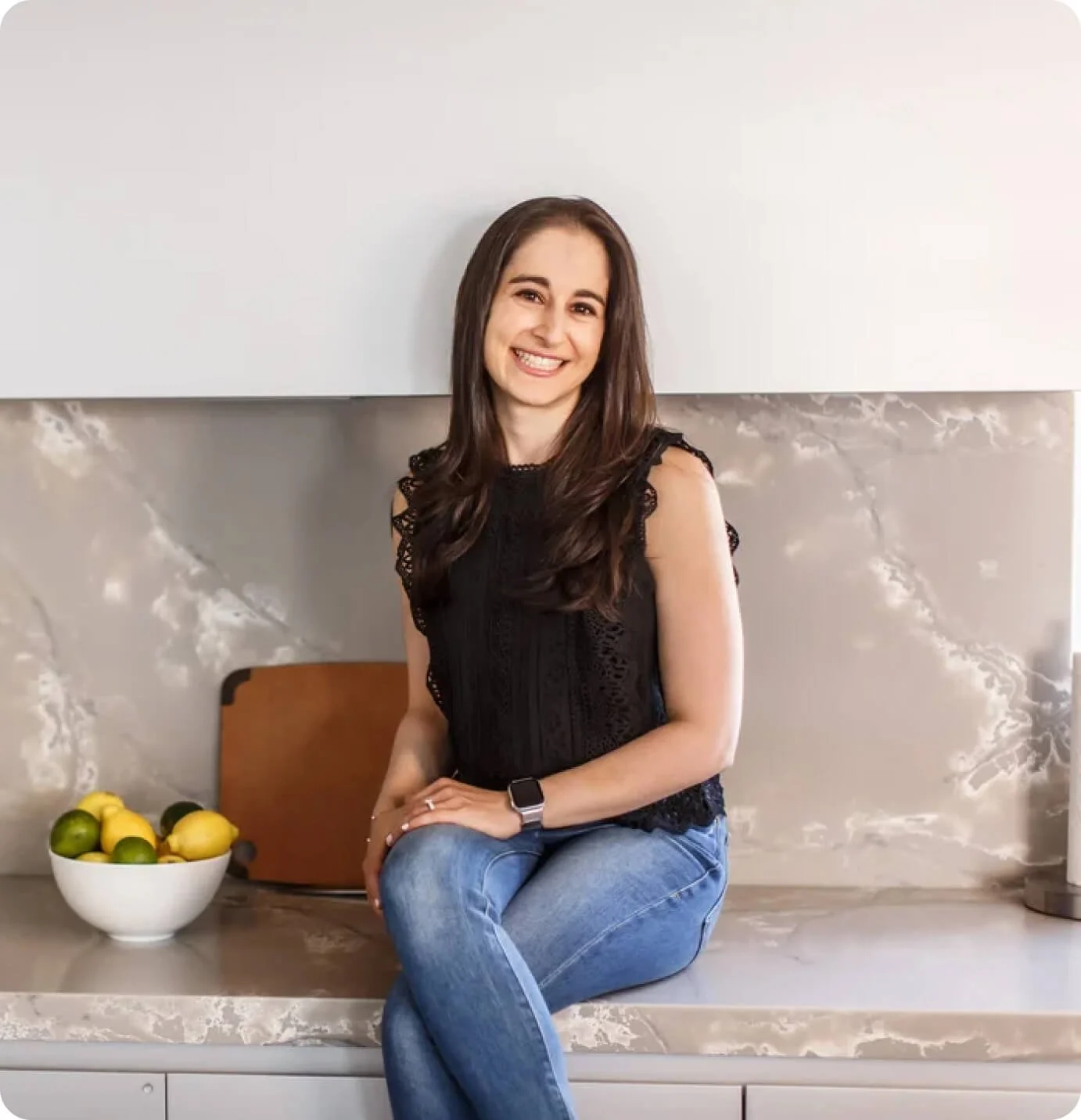 Melissa Schuster, registered dietitian and nutrition expert, smiling in her kitchen