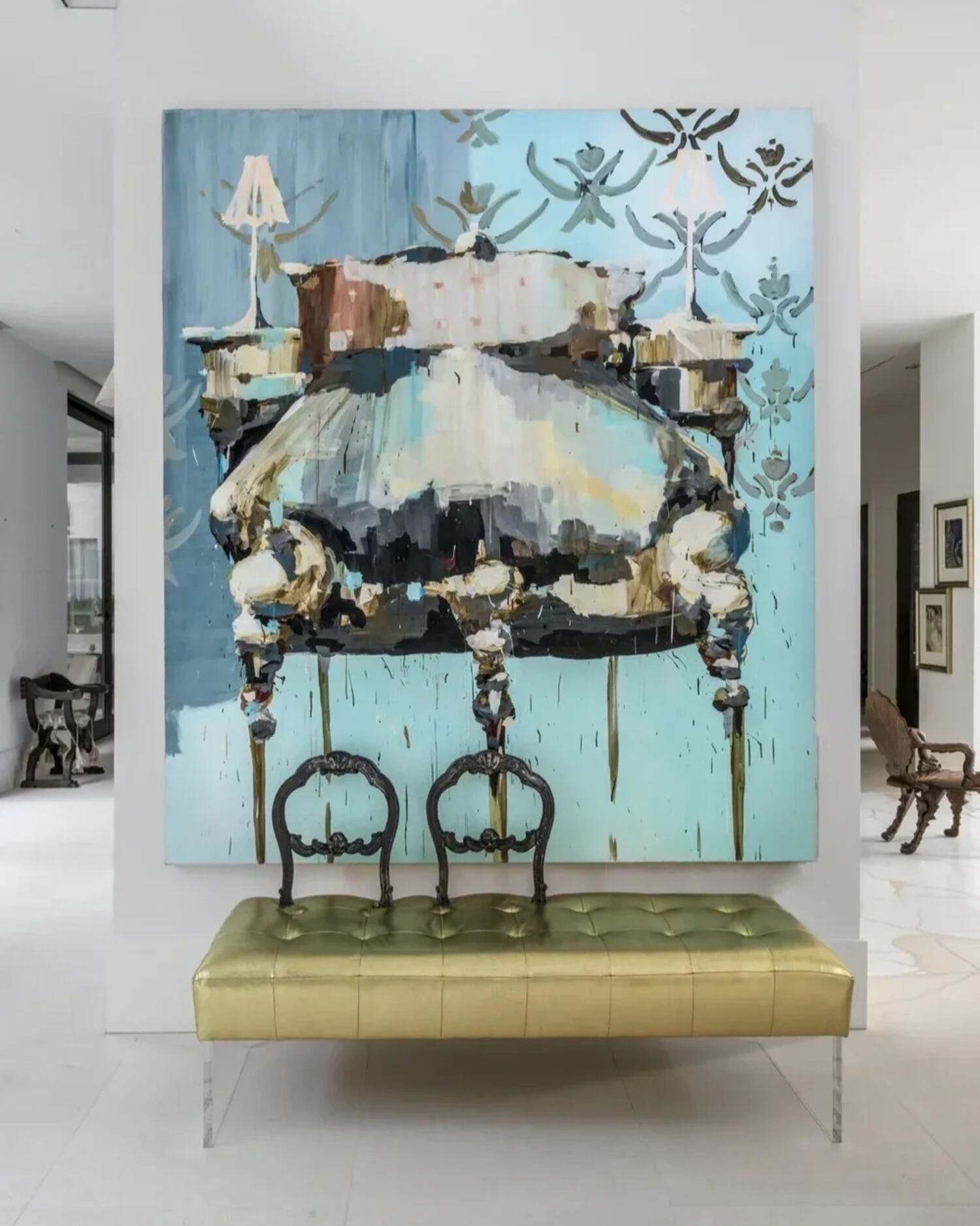 Residential interior project at Saddlebranch featuring oversized artwork, a green bench and sculptural furniture.