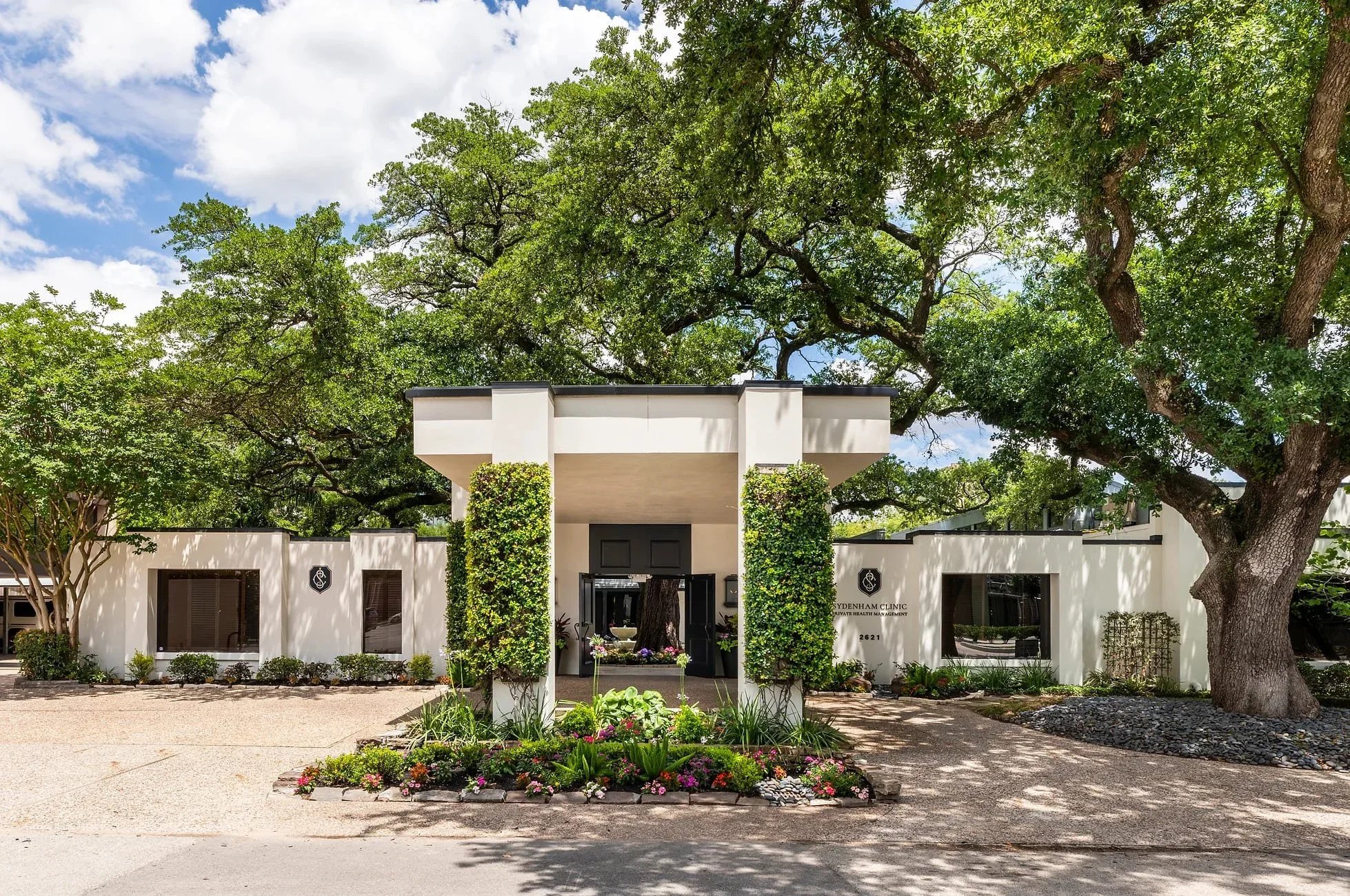Commercial project designed by a Houston interior design firm, blending architecture, landscape, and refined material detailing.