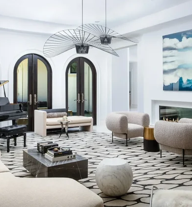 Full-service residential interior design with a grand piano, soft curved seating, and a refined contemporary layout for entertaining