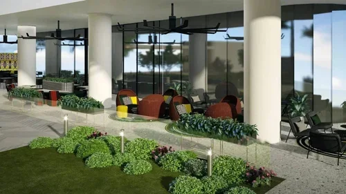 Commercial interior design project at Thompson Hotel Houston, showing a landscaped rooftop terrace with modern seating.