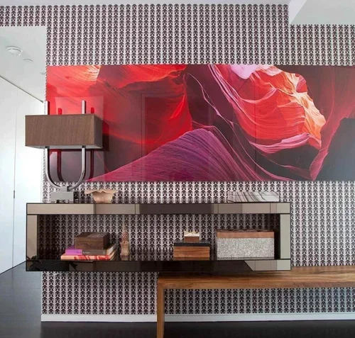 Interior designer New York penthouse in Hudson Yards with patterned wallcovering, sculptural console and vivid artwork.