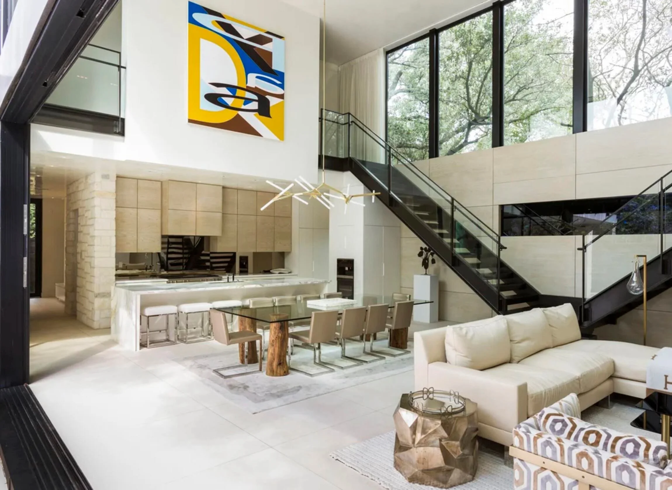 Light-filled open-plan private residence by Lucinda Loya Interiors with custom furnishings and artwork.