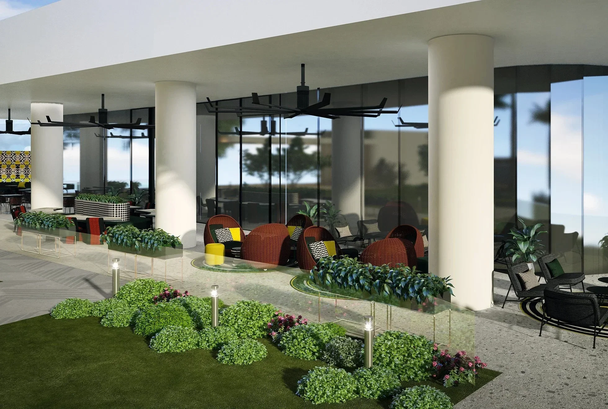 Houston hospitality interior design for a hotel outdoor lounge with layered seating, landscaping and a refined guest experience