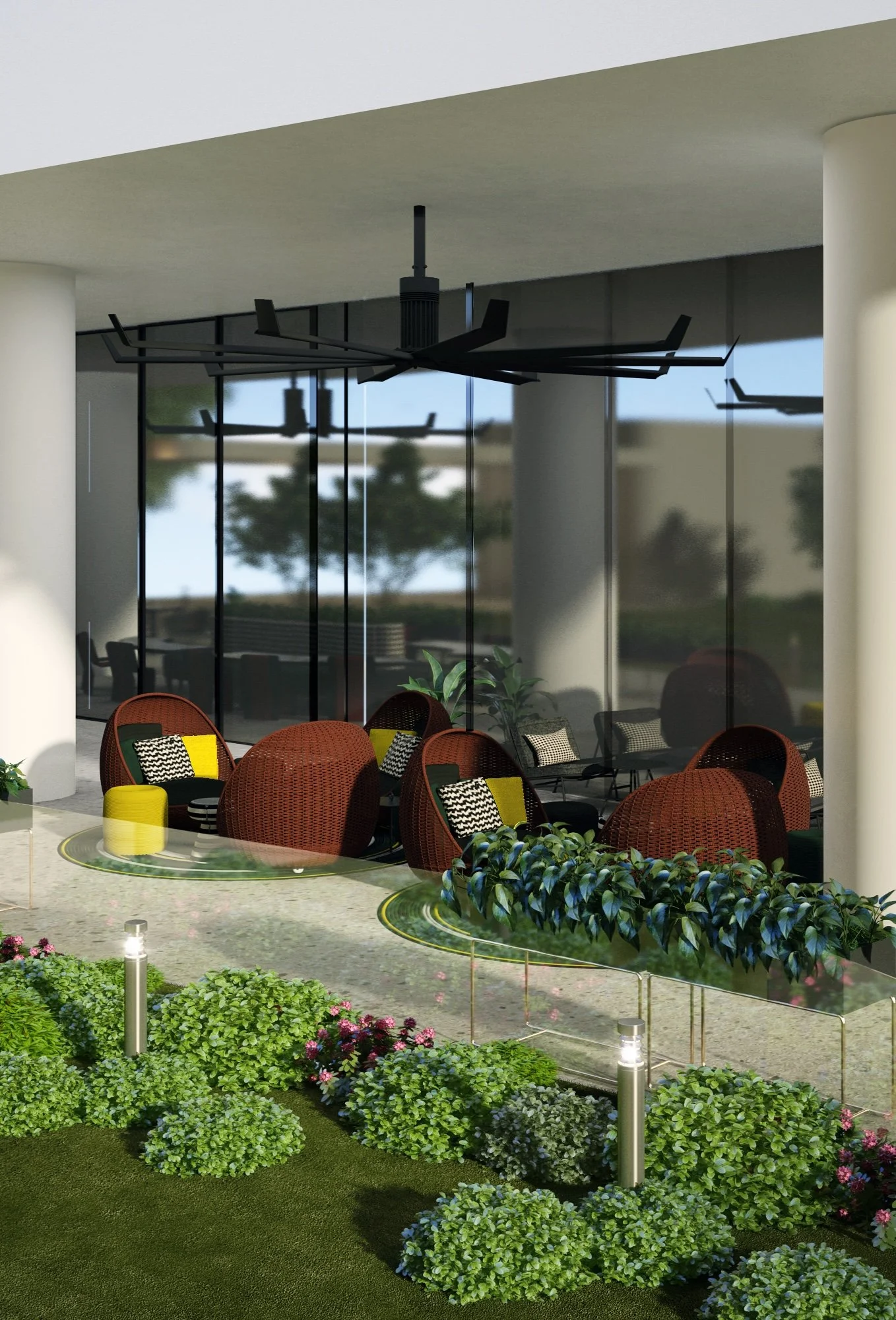 Commercial hospitality design concept with landscaped outdoor lounge seating, sculptural ceiling fans and glass walls.