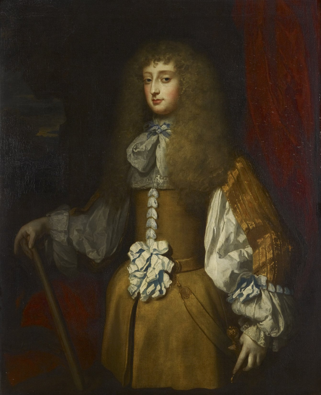 Portrait of Frances Stuart wearing a buff coat, with her hair styled to resemble a male periwig, and carries a baton of command – as Samuel Pepys notes she is dressed “like a soldier”.