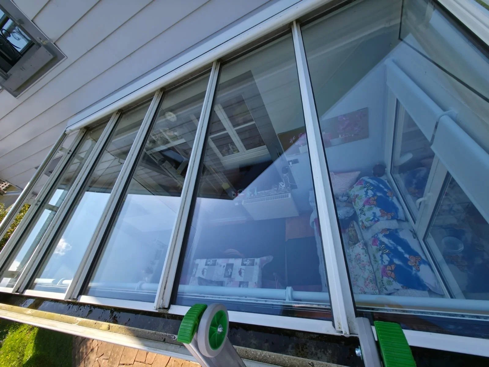 Nettoyage de vitrages à la perche