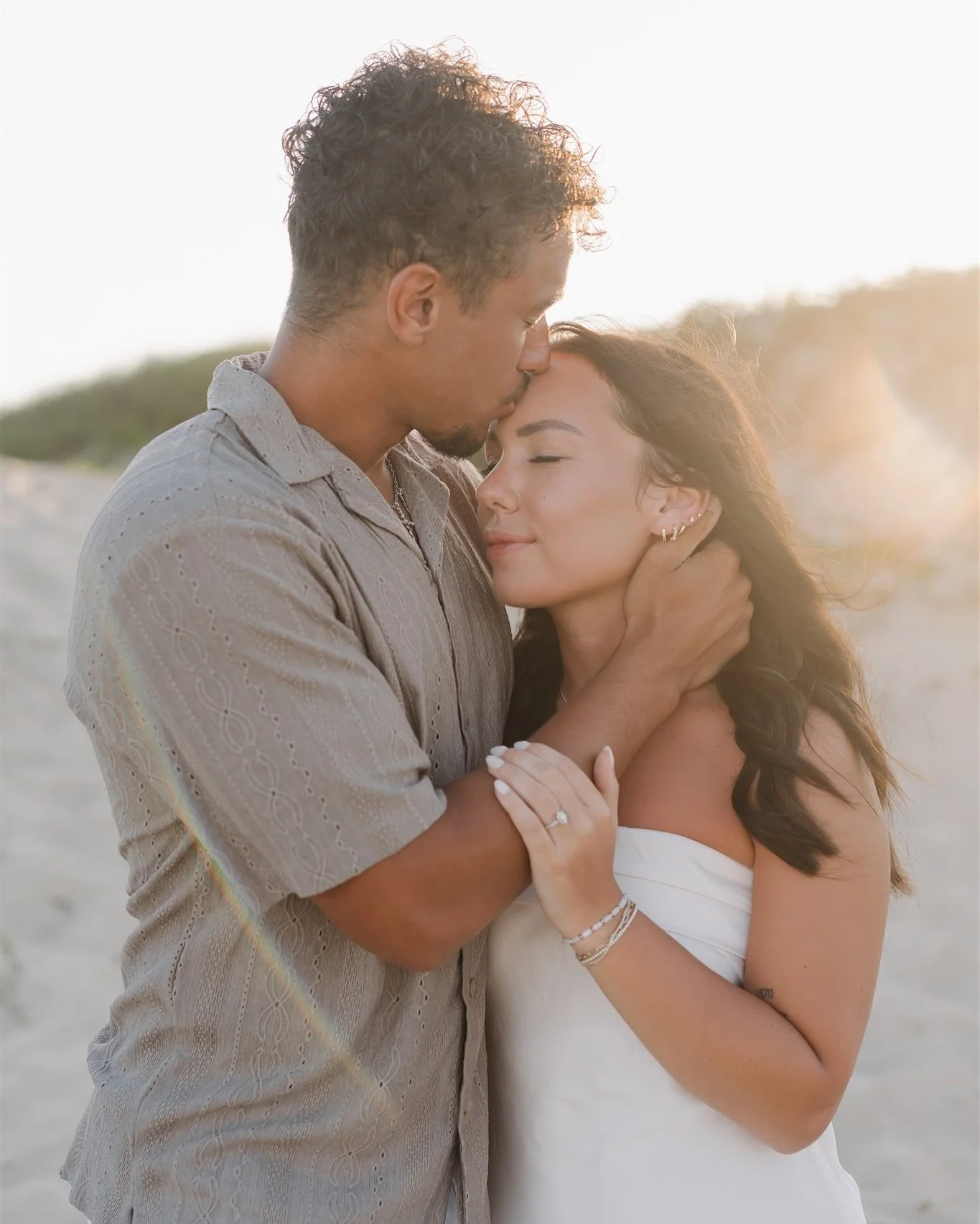 Emaly + Noah&rsquo;s engagement session ✨
_
All the romantic vibes! Their session took place during warm, summer evening on the beach. Golden hour extended into blue hour 🤍

#southpadreislandphotographer #beachengagement 
South Padre Island