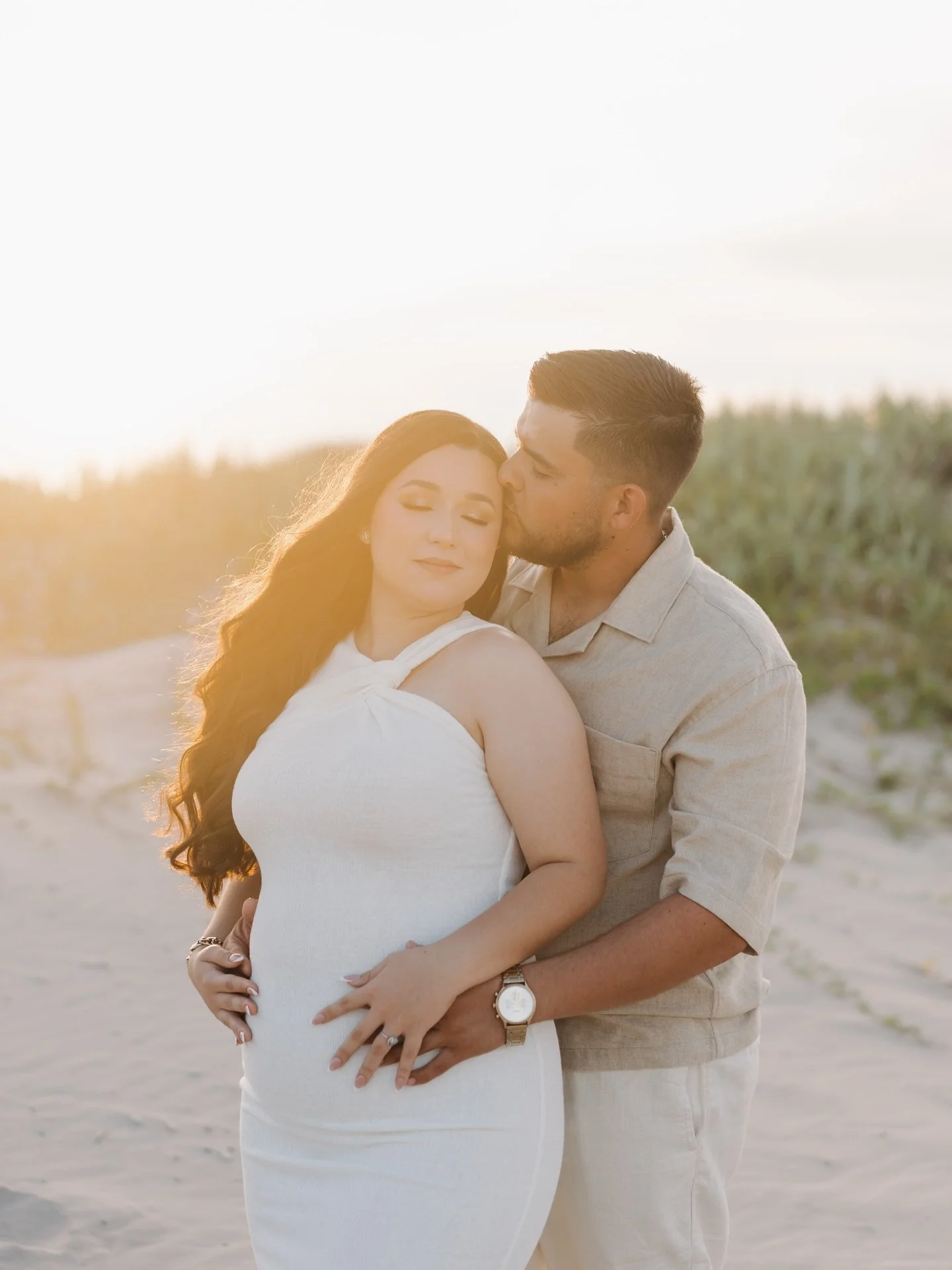 The chapter where Valeria + Ernesto are expecting ✨🤍
_ 
V + E had their pregnancy announcement photographed during a gorgeous evening on the beach. Golden hour hit as we started their session. The sun casted orange hues behind the sand dunes.
I love