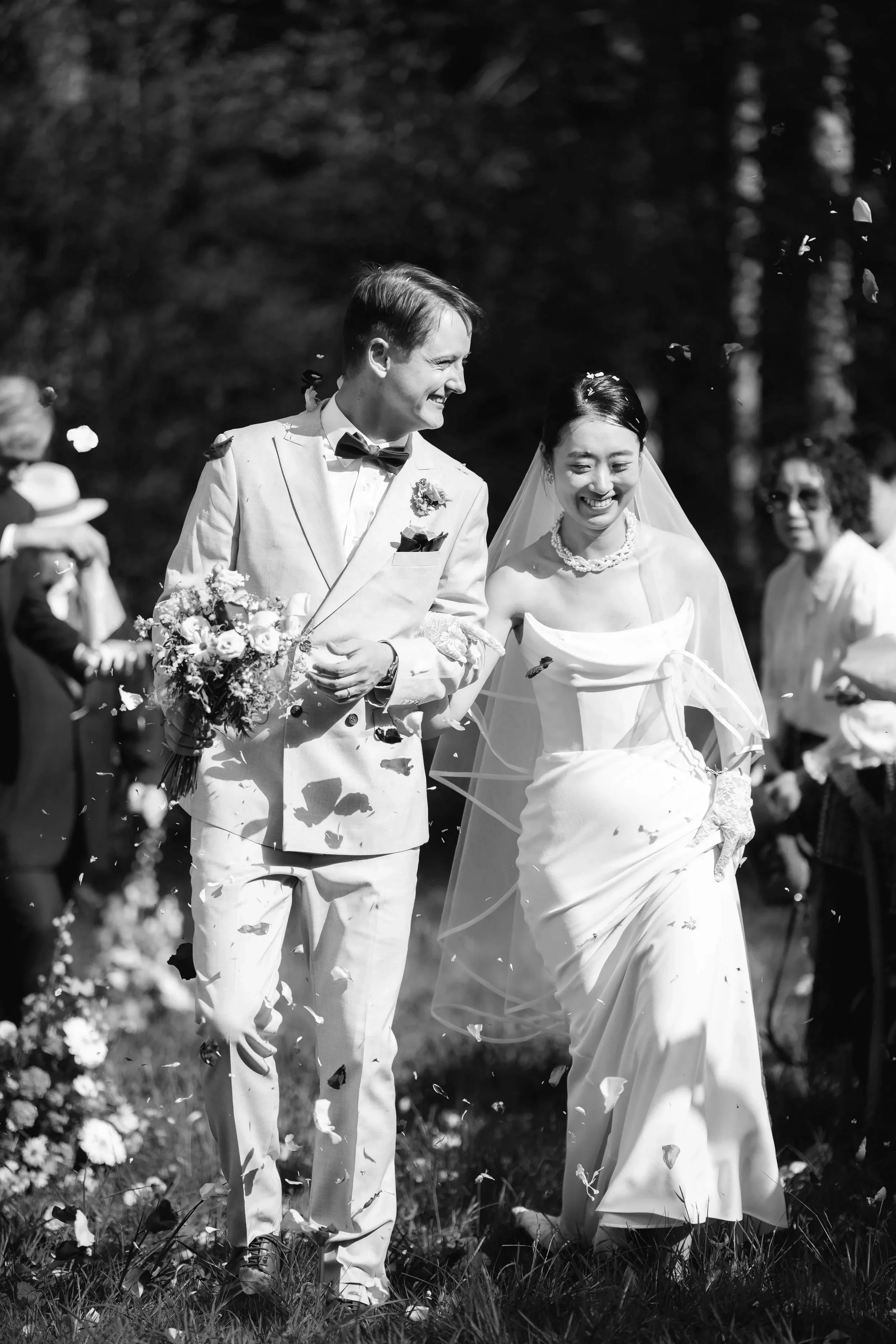 hugo-eva-walking-down-the-aisle-b&w.webp