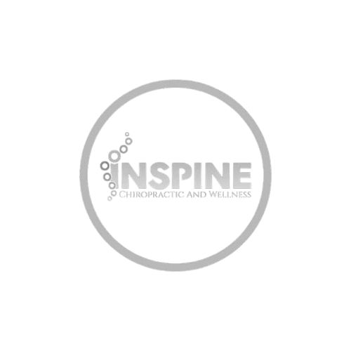 Logo with the word "INSPIRE" inside a circle, with smaller text "Chiropractic and Wellness" beneath, on a black background.