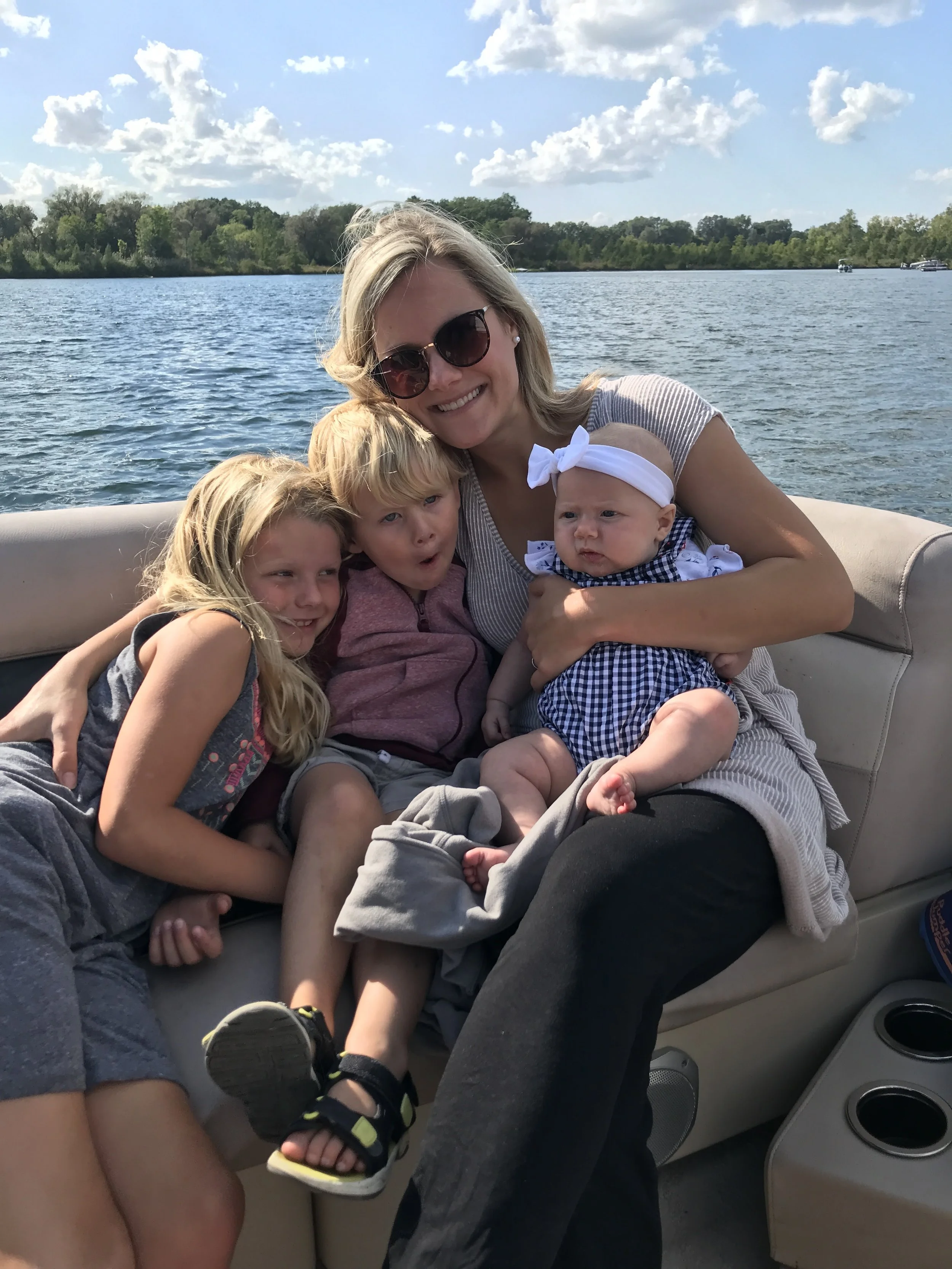 Family boating on lake near South Lyon Michigan