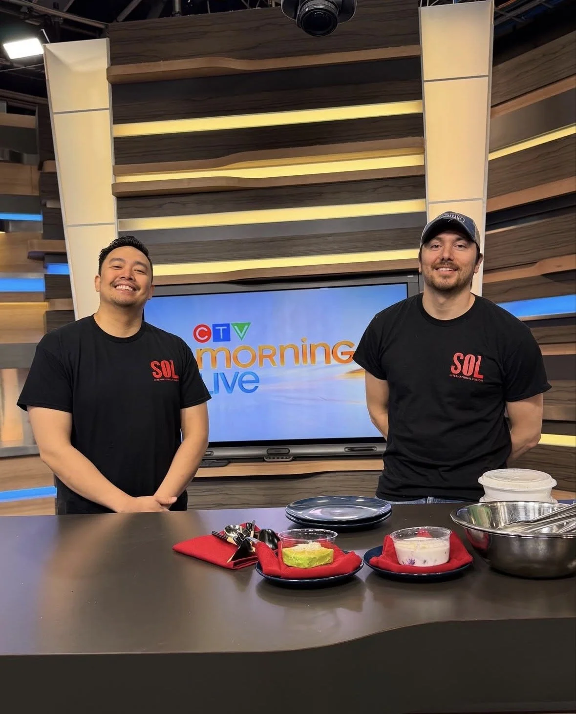 Chefs Ovie Lawrenchuk and Samuel Cadelina on the CTV morning show, showcasing gluten free Asian-fusion dishes for Asian heritage month.