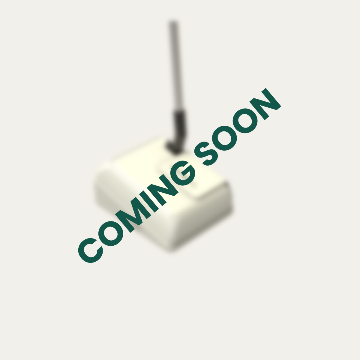 A blurred white "PutterUp" putter cover with the text 'COMING SOON' in bold, dark green letters.