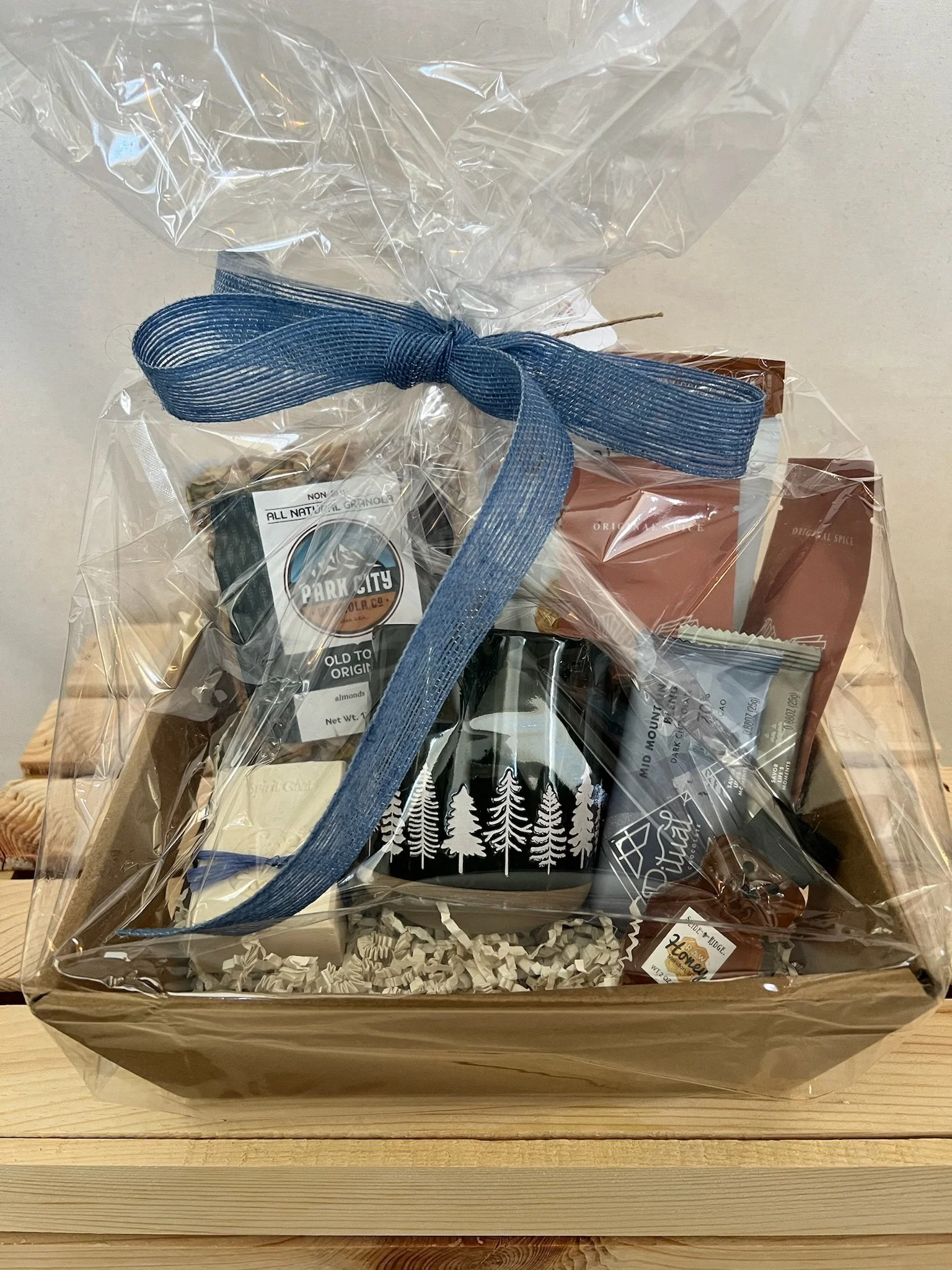 Slow morning gift basket with pancake mix, hot cocoa, granola, honey, chocolate, and lavender soap