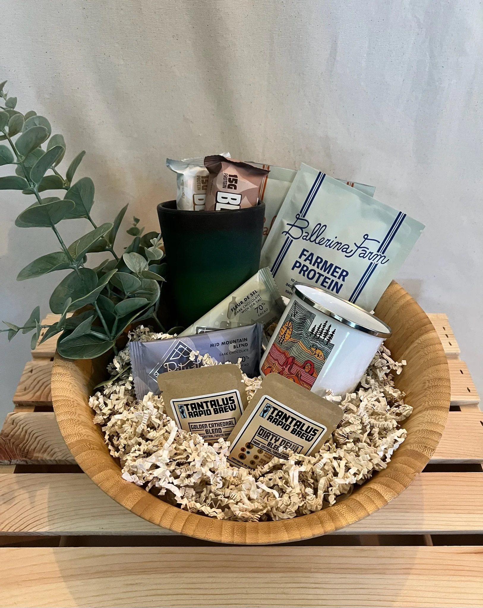 bamboo bowl filled with Utah treats, coffee, and mug
