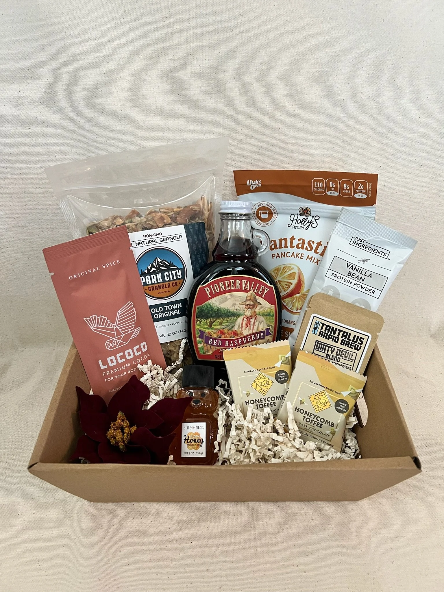 Utah brunch gift box with pancake mix, raspberry syrup, honey, granola, freeze dried coffee, and Ritual Chocolate