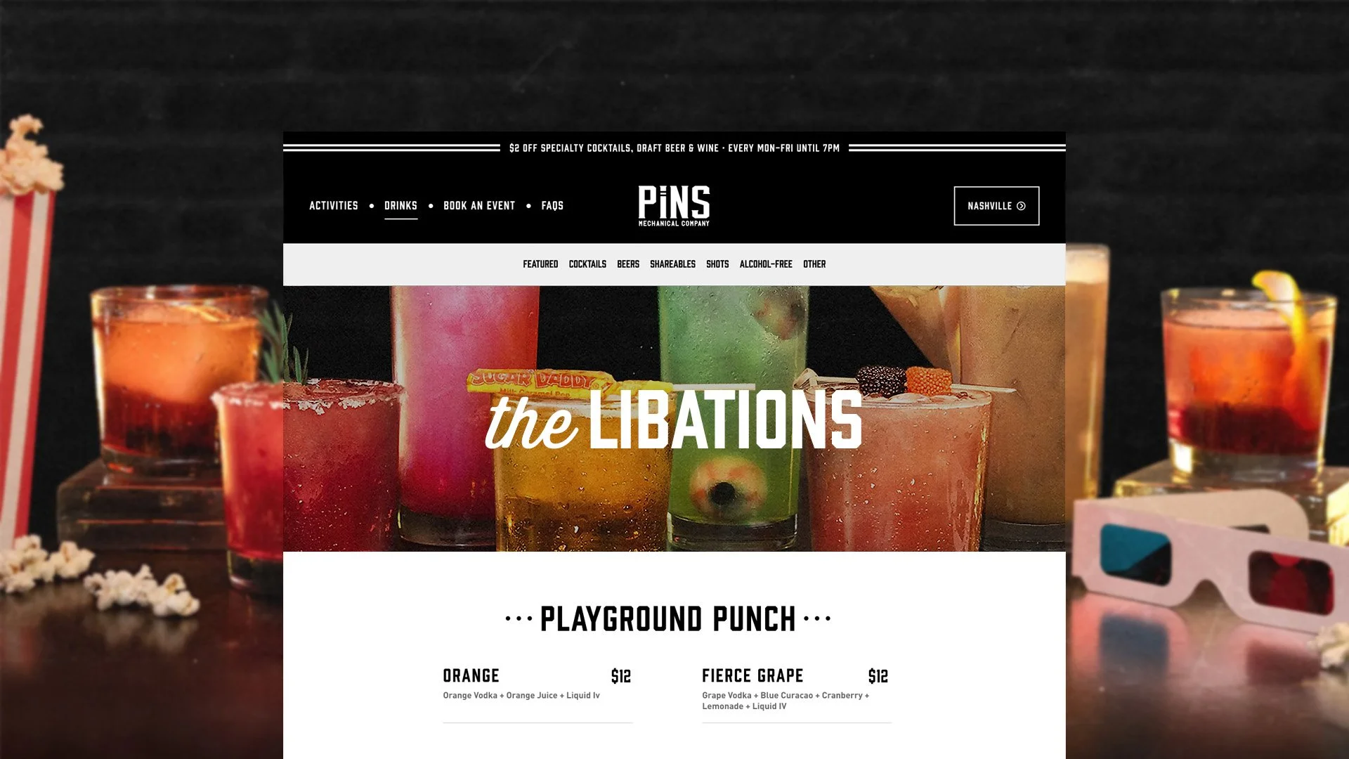 A menu from a bar named PINs showing colorful cocktails, with popcorn, 3D glasses, and drinks on a dark surface in the foreground.