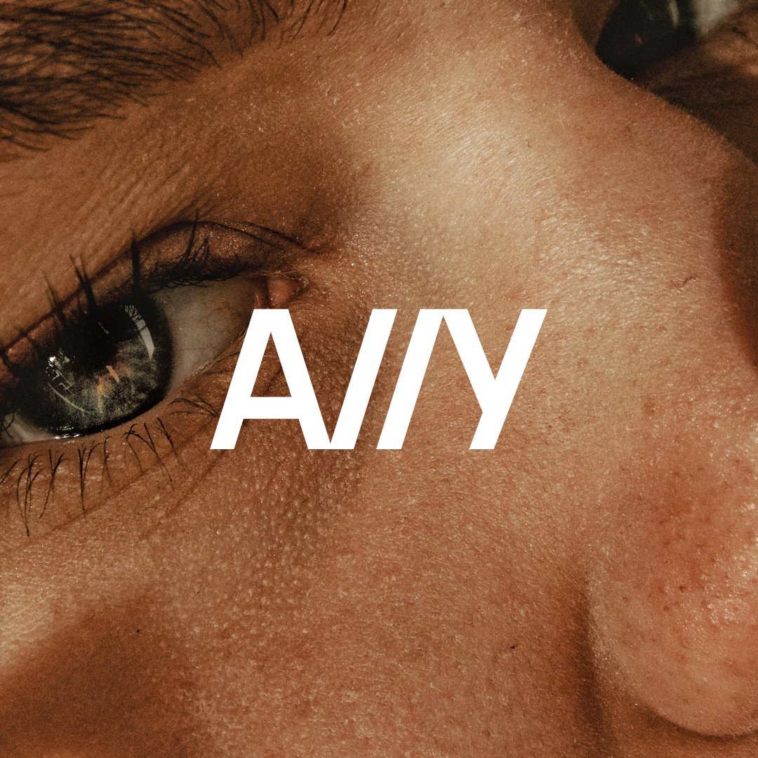 Close-up of a person's face focusing on their eye and cheek with the word 'ANY' overlayed.