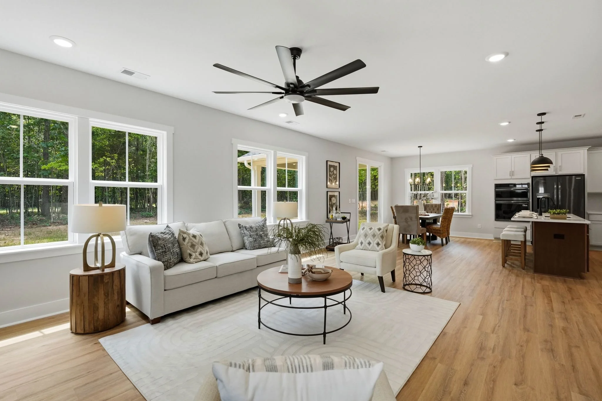 Open-concept kitchen and living area in a new construction home