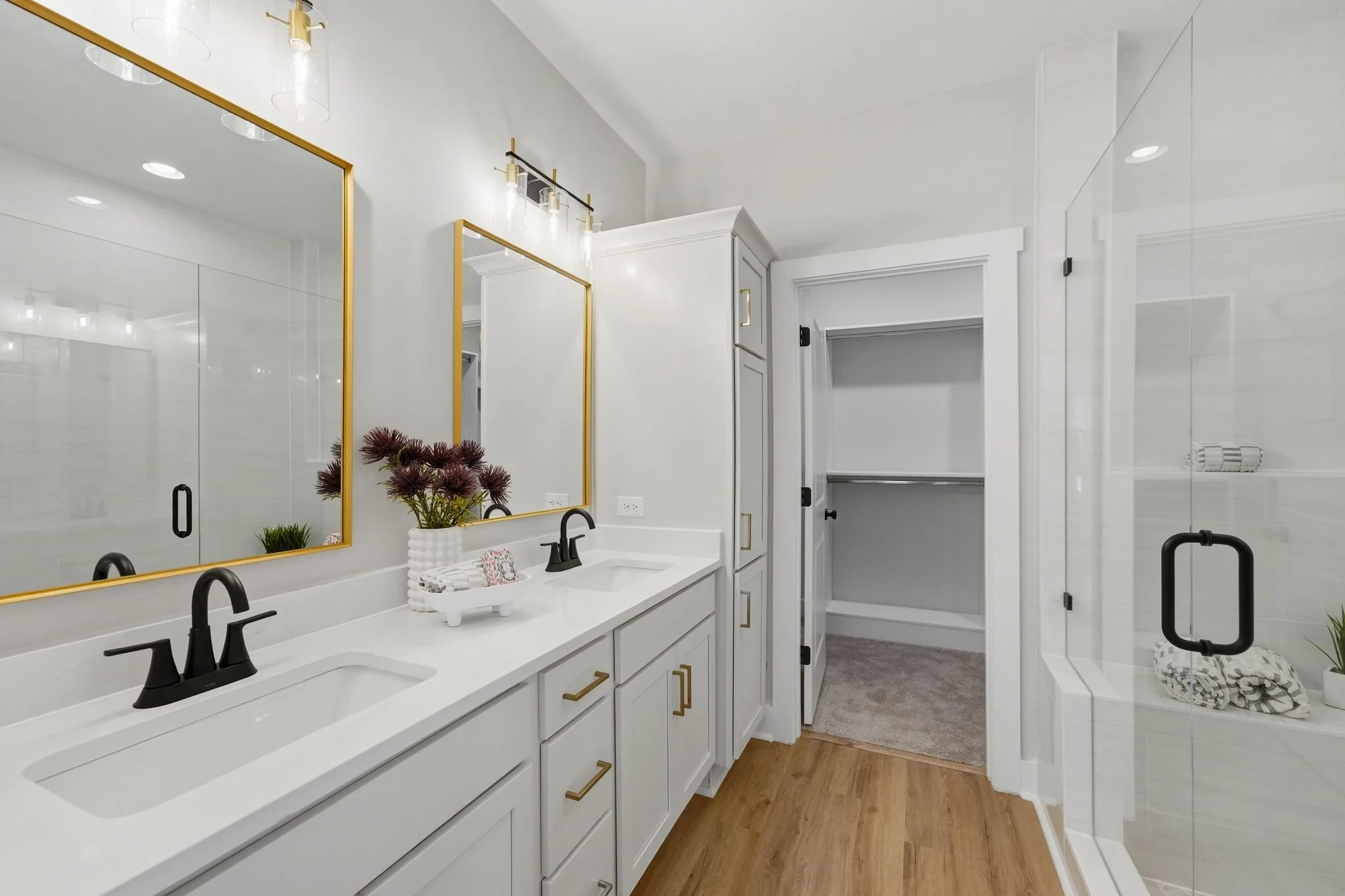 Luxury primary bathroom with tile shower