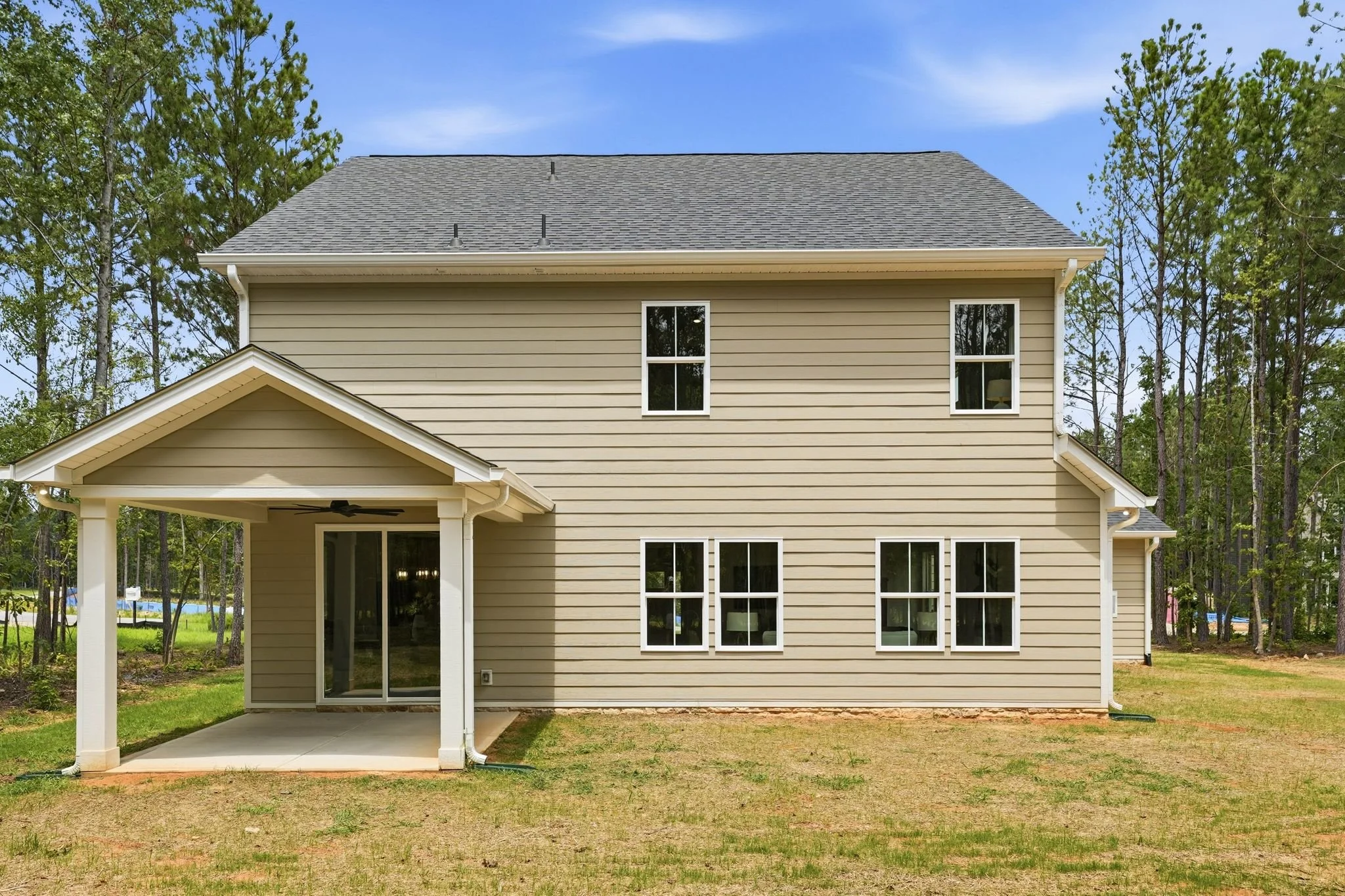 Rear exterior of a custom-built new construction home in the Baylor Grove community in Monroe, NC