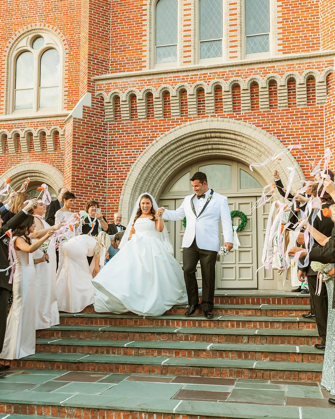 Final_Wedding_MiaAndAndre_ExitOutsideChurch-30.jpg