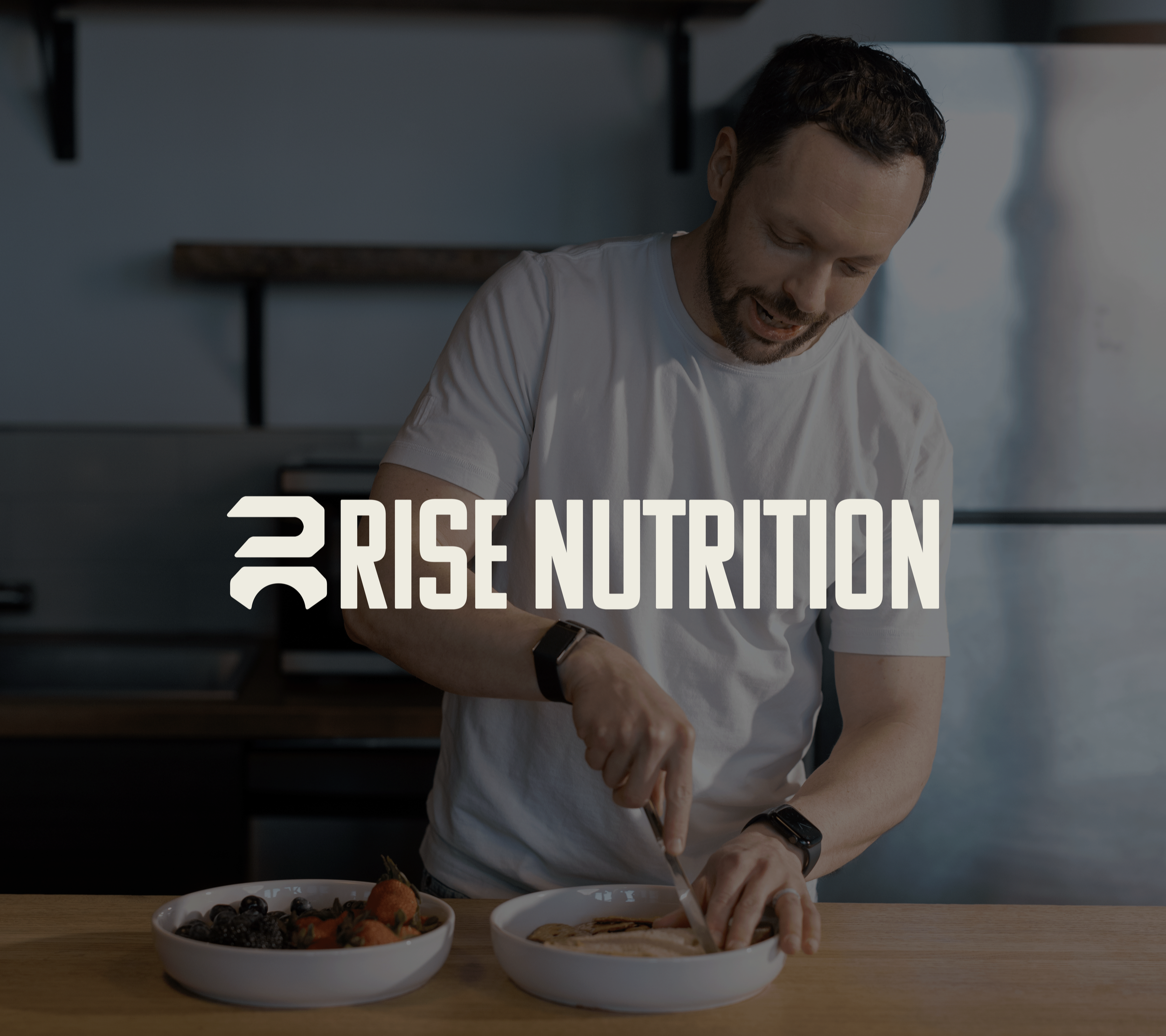 Rise Nutrition brand photography of nutrition coach preparing whole food meal in kitchen with logo overlay by Signature Narratives