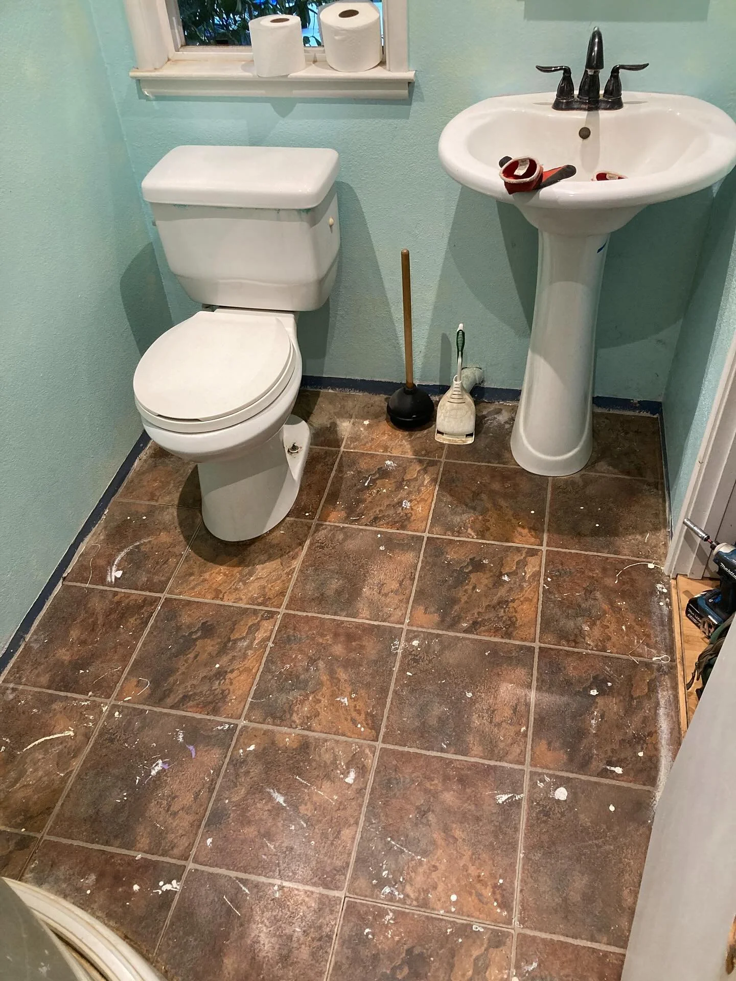 Mini bathroom remodel. New subfloor and  vinyl flooring with a new vanity and toilet on the way. I hope that shower gets cleaned professionally.