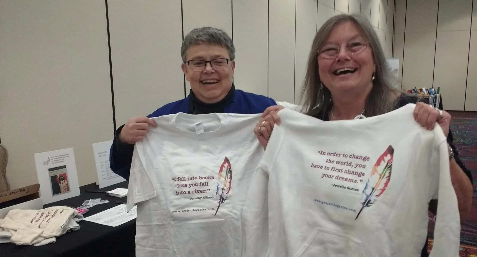 Elana Dykewomon & Dorothy Allison, sporting logowear.