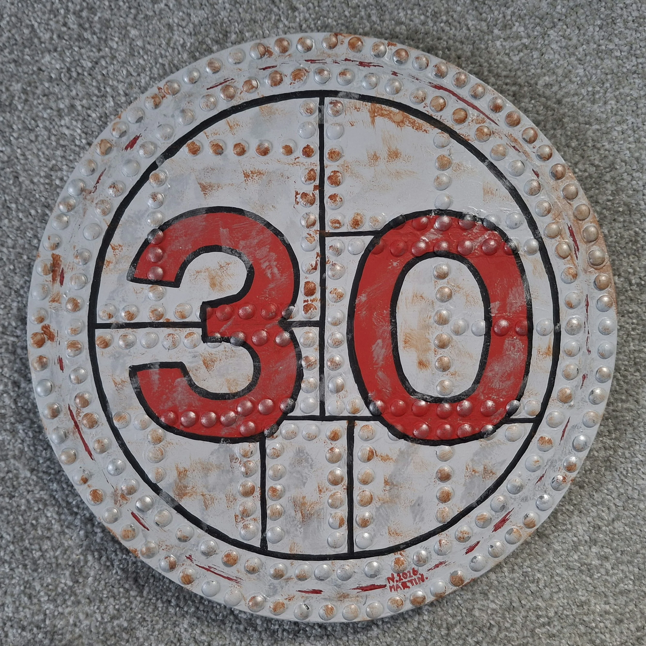 "30" mph speed limit sign, re-imagined in a rivets design. 30cm round