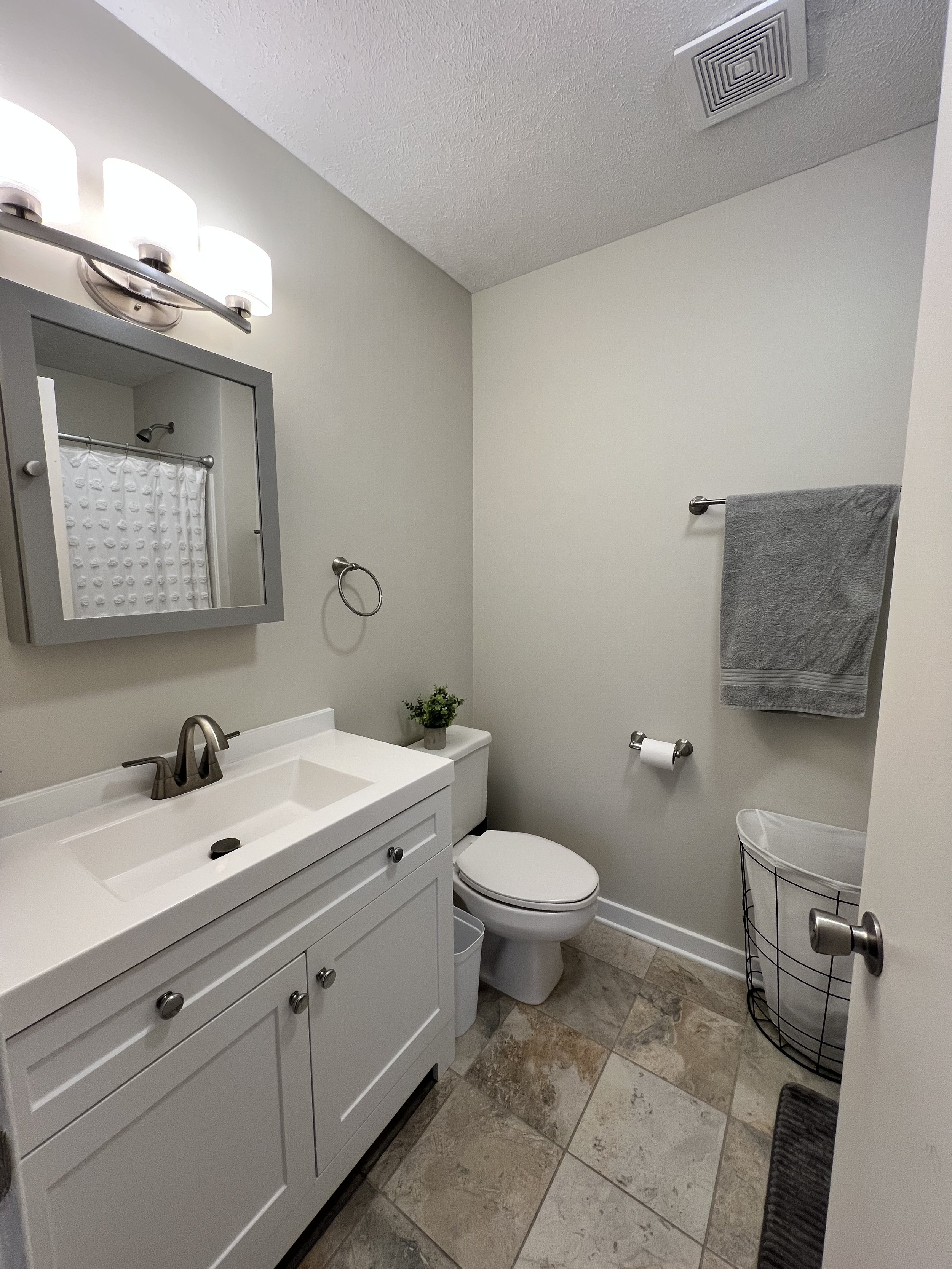 Upstairs Master Bathroom with bath/shower