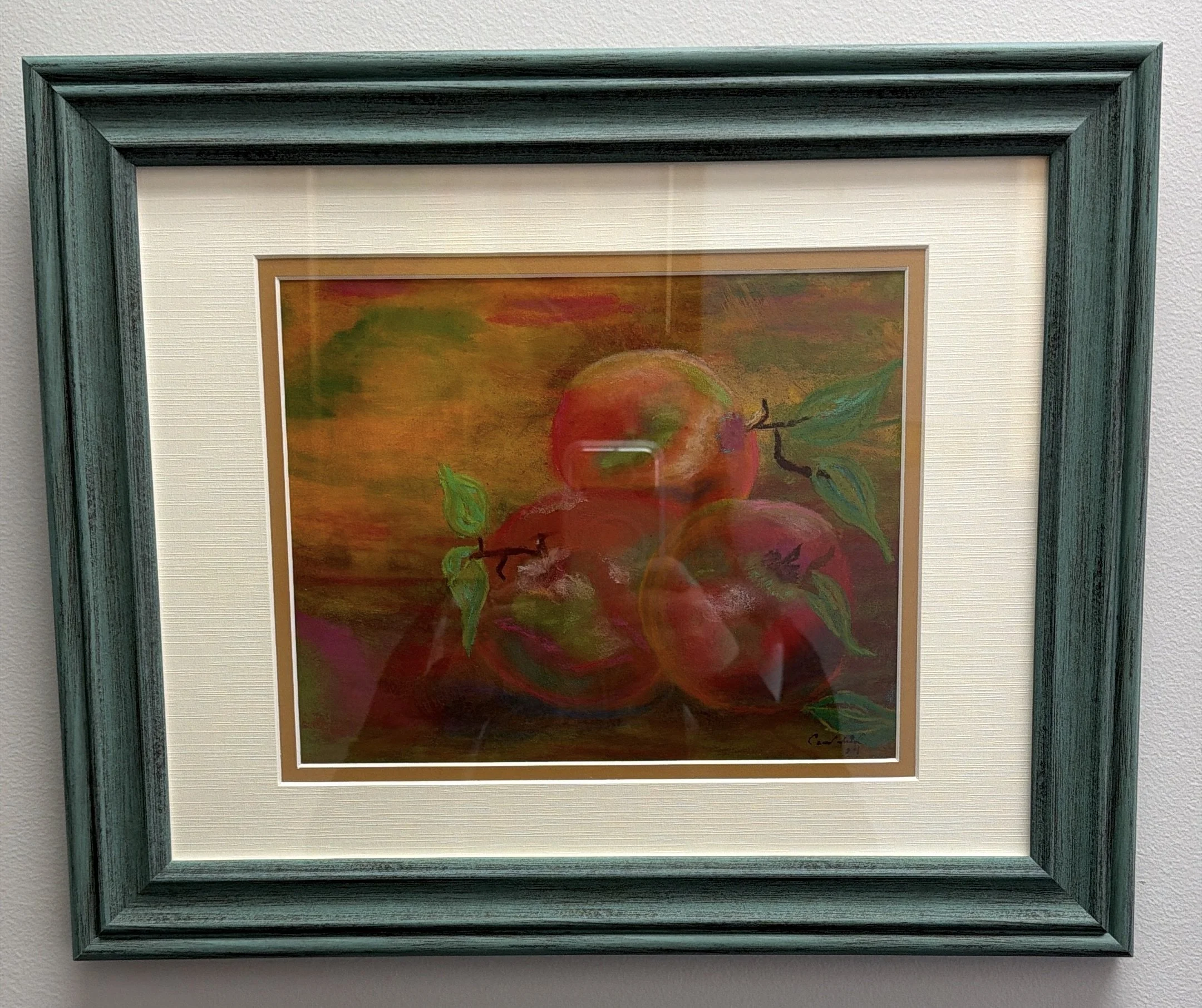 framed oil pastel of apples by artist Carol Friend