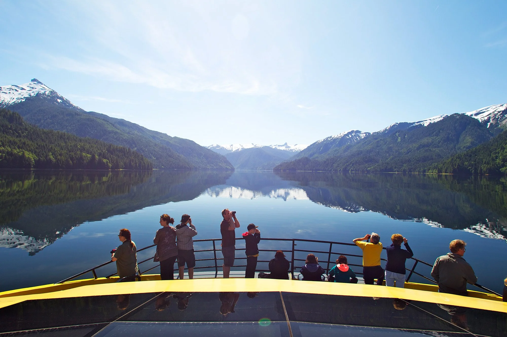 Scenic view of water with people on a boat