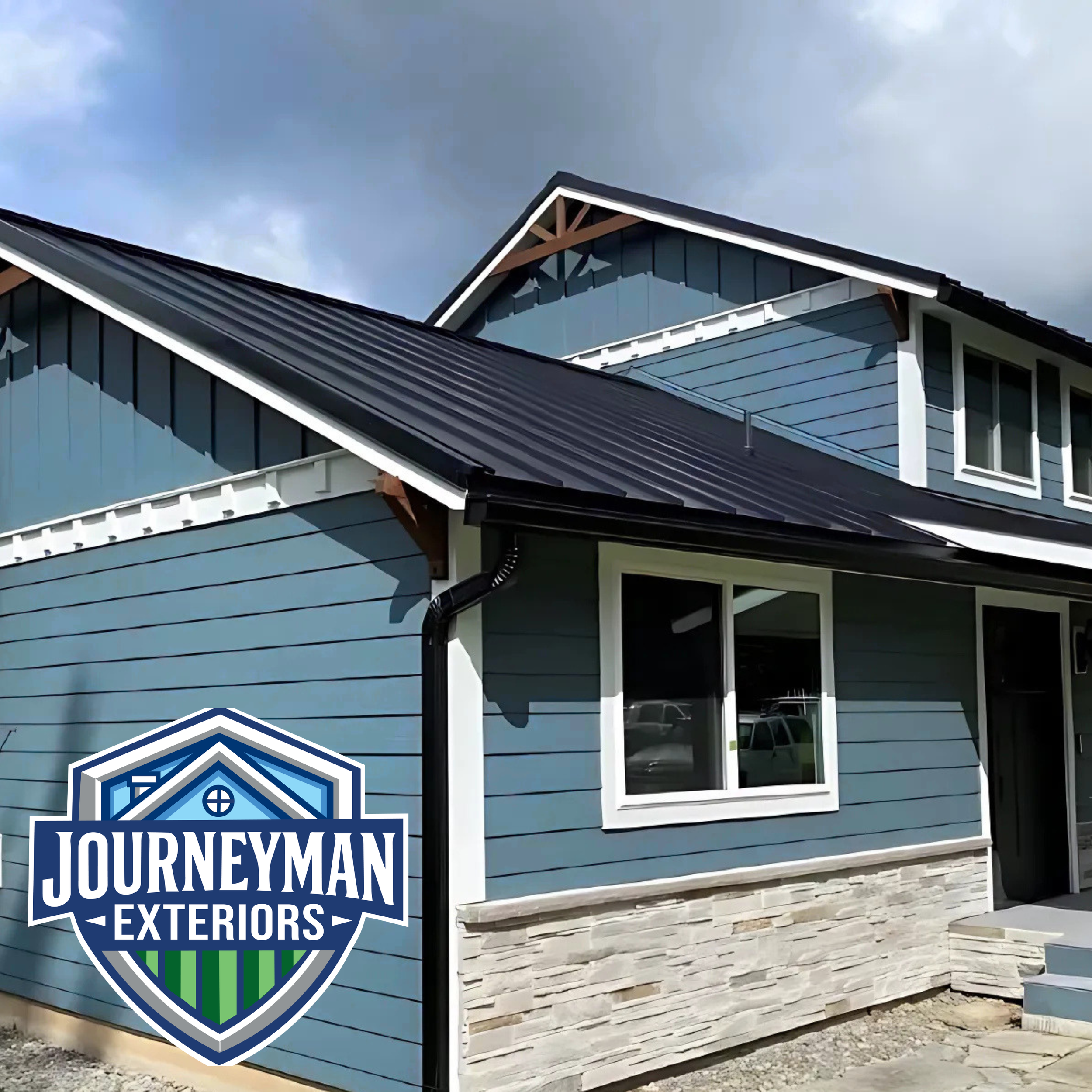 journeyman exteriors blue house full exterior remodel.png