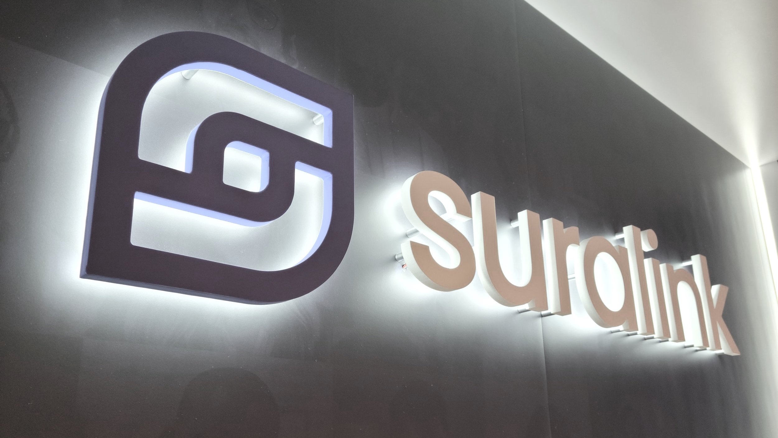 backlit Suralink logo