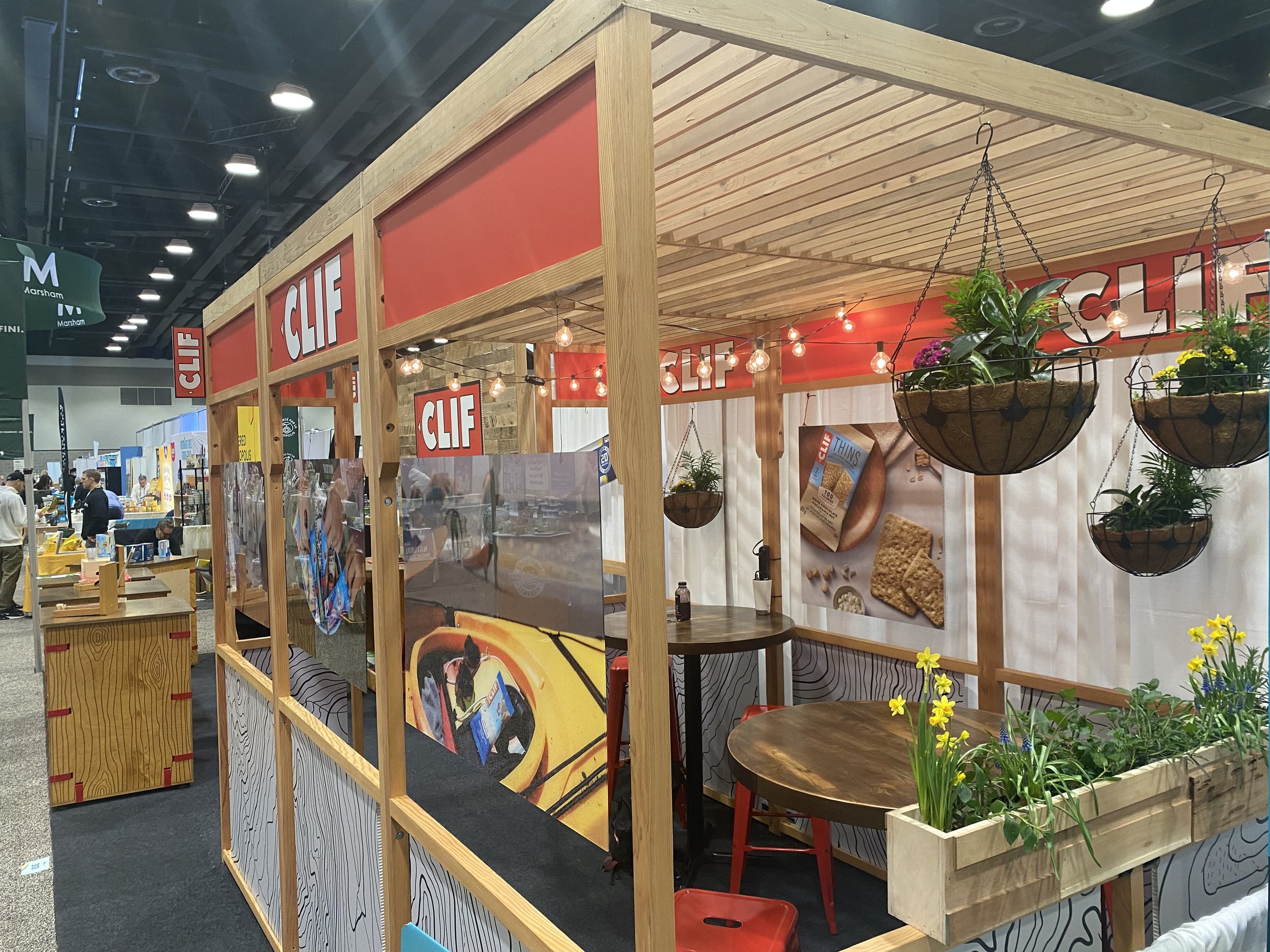 View of modular Cafe with planters and trellis style roof.