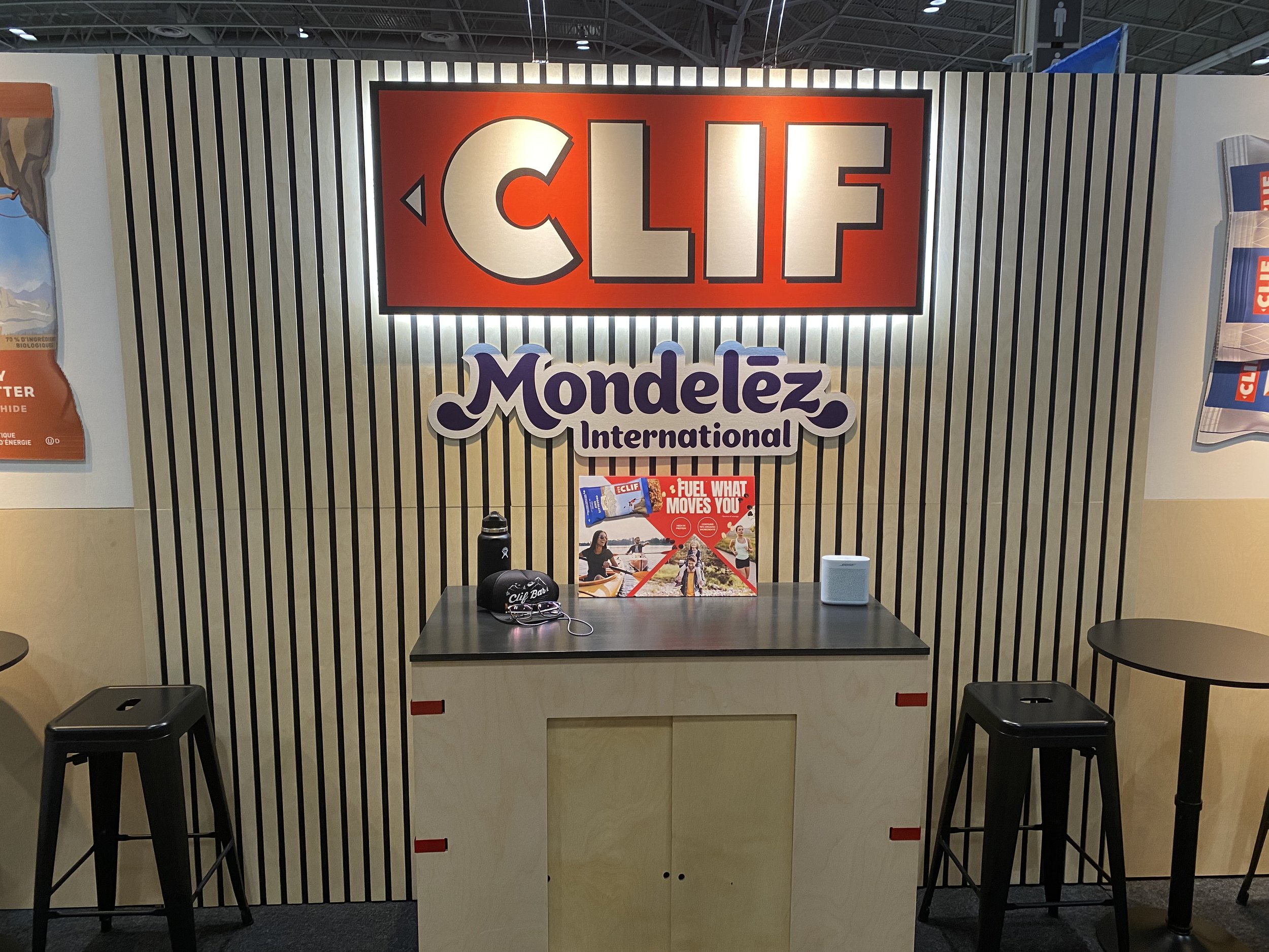 Slat wall and back counter closeup shot. Edge lit CLIF logo