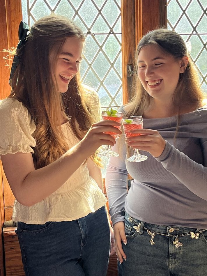 Nora and Kinsey- toasting.jpg