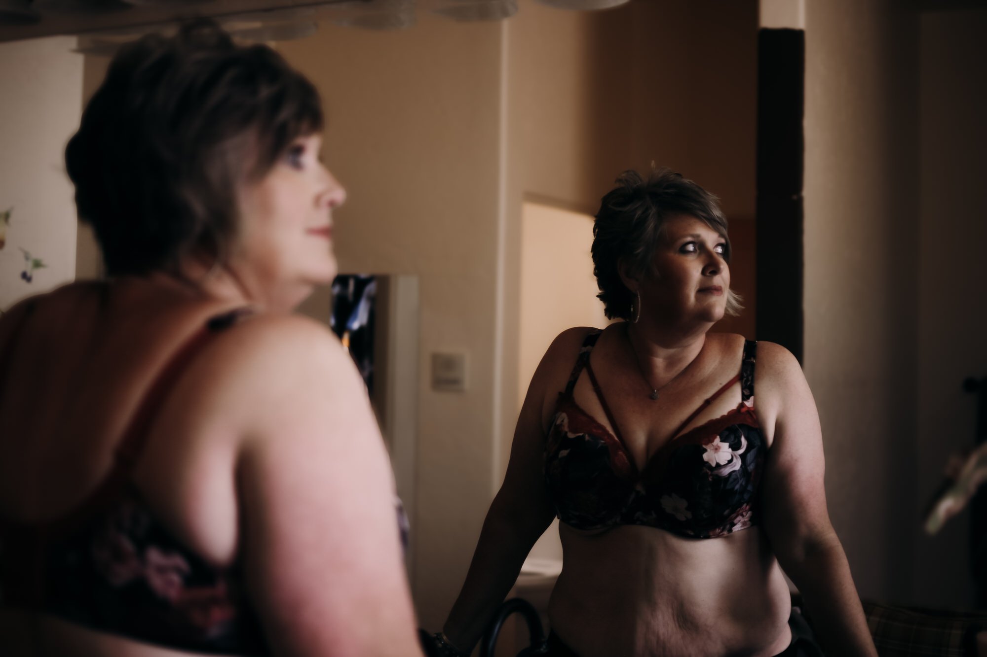 Elegant boudoir portrait for women over 40 celebrating confidence, femininity, and self-acceptance.