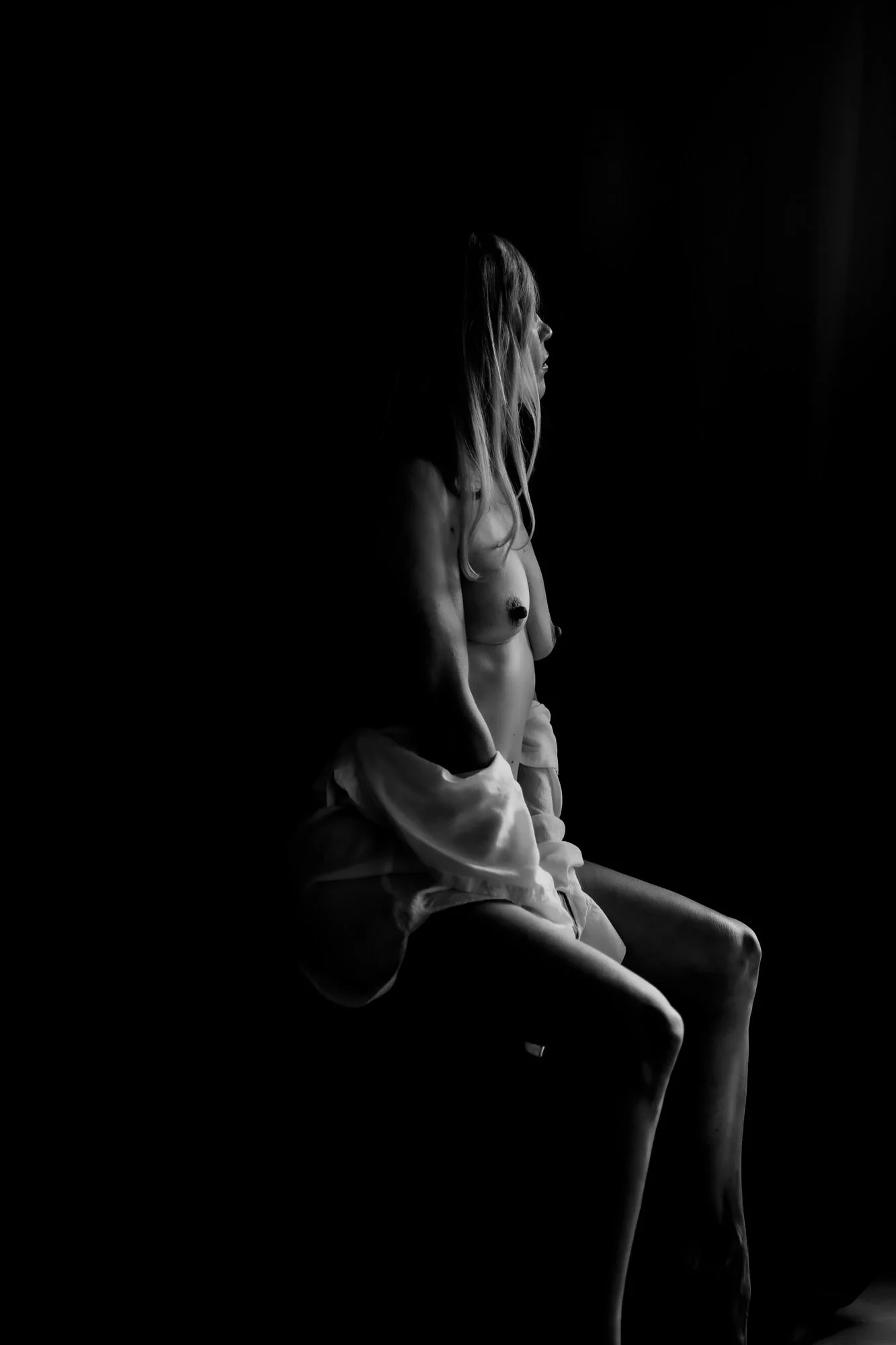 Fine art boudoir photography showcasing beauty, strength, and confidence after 40.